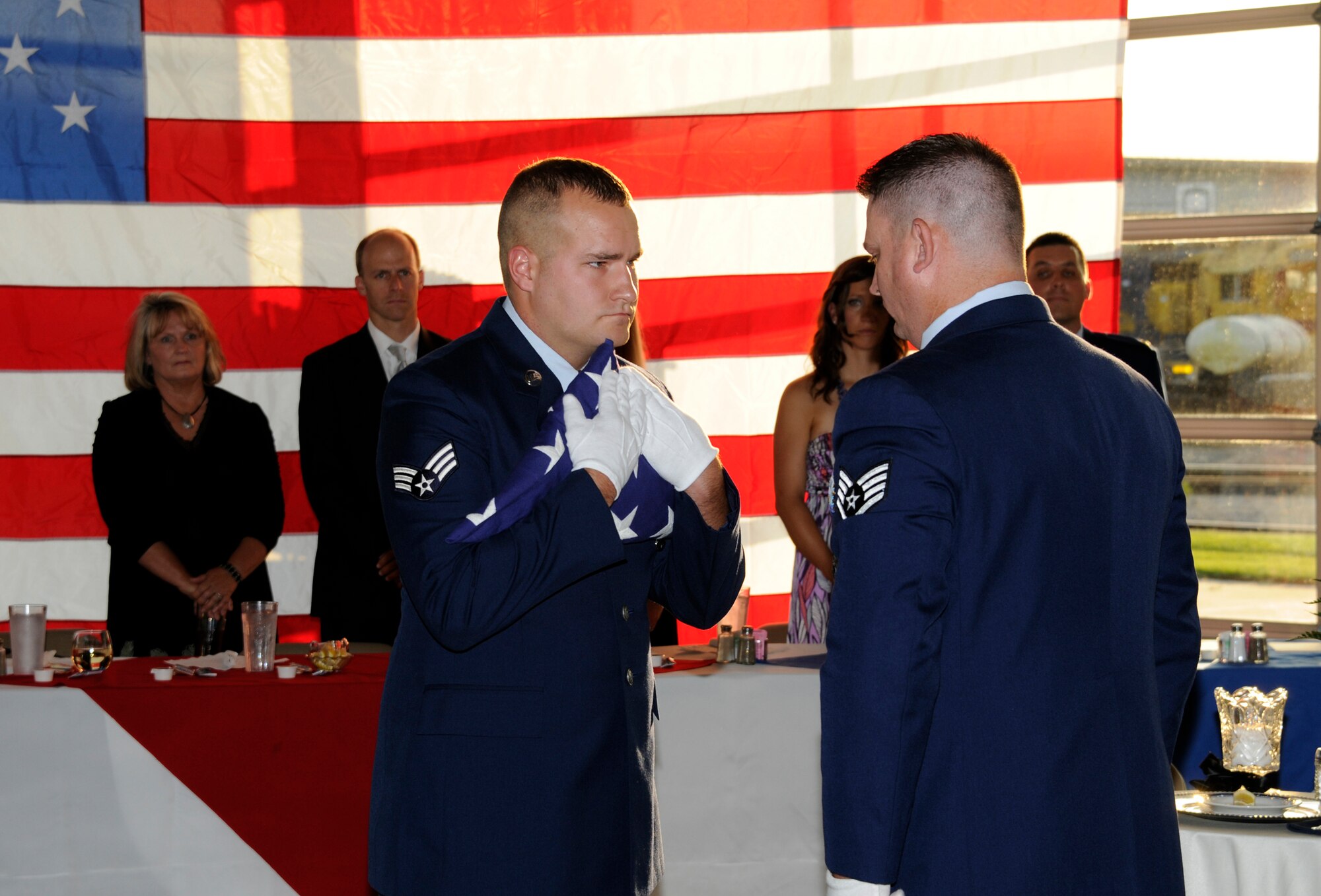 Members of the 188th Civil Engineering Squadron attend a formal dining-in ceremony Aug. 10 to help foster squadron camaraderie before the unit ventured to Tyndall Air Force Base, Fla., to participate in Exercise Silver Flag during annual training. (U.S. Air Force photo by Senior Master Sgt. Dennis Brambl)