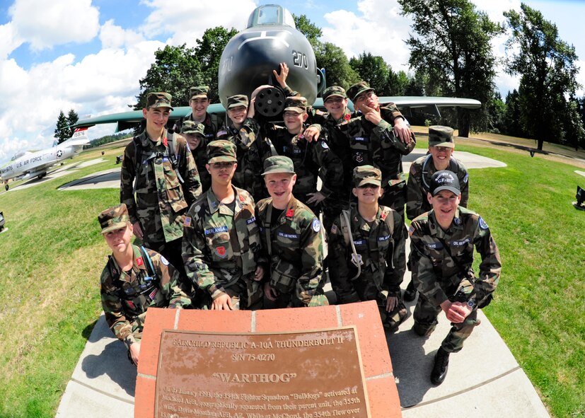 A group of Civil Air Patrol cadets, ages 12 to 16, explore McChord Field’s Heritage Hill August 15, 2011, at Joint Base Lewis-McChord, Wash. The group toured organizations around the wing such as the Fire Department, Air Traffic Control Tower and the Aerial Port Squadron. (U.S. Air Force photo/Adamarie Lewis-Page)