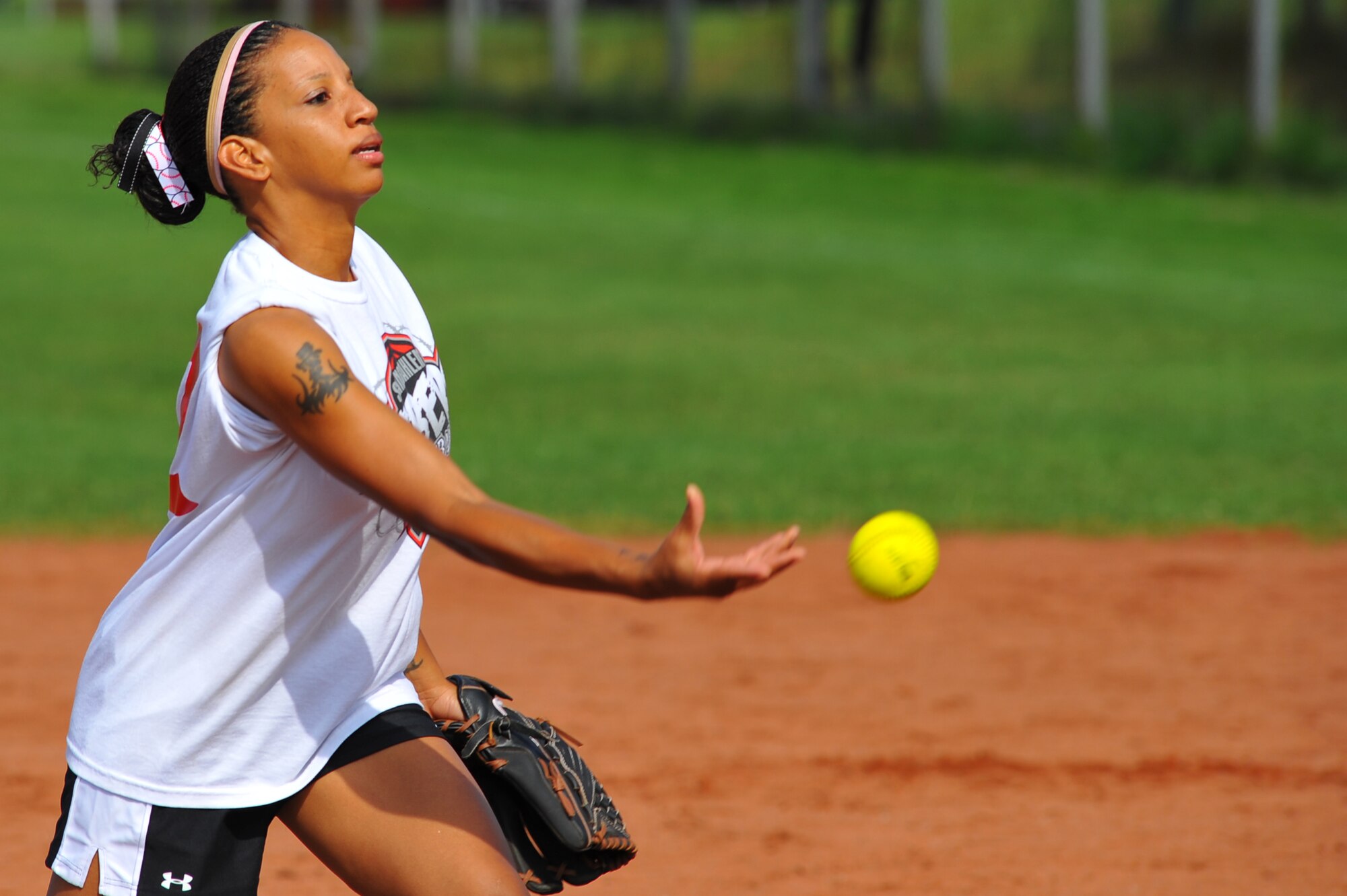 SPANGDAHLEM AIR BASE, Germany –Heather Keels, Spangdahlem Lady Sabers, pitches a softball during the U.S. Armed Forces in Europe softball championship here Aug. 19. The Spangdahlem Lady Sabers beat the Incirlik Lady Sultans 14-0 in this preliminary game. The Ramstein Lady Rams beat the Lakenheath Lady Eagles 5-4, and the Ramstein Rams beat the Aviano Dragons 28-16 in the final championship games. Both male and female U.S. Forces softball teams from the Army and Air Force, including the Spangdahlem Saber teams, participated in the annual event. (U.S Air Force photo/Airman 1st Class Dillon Davis)