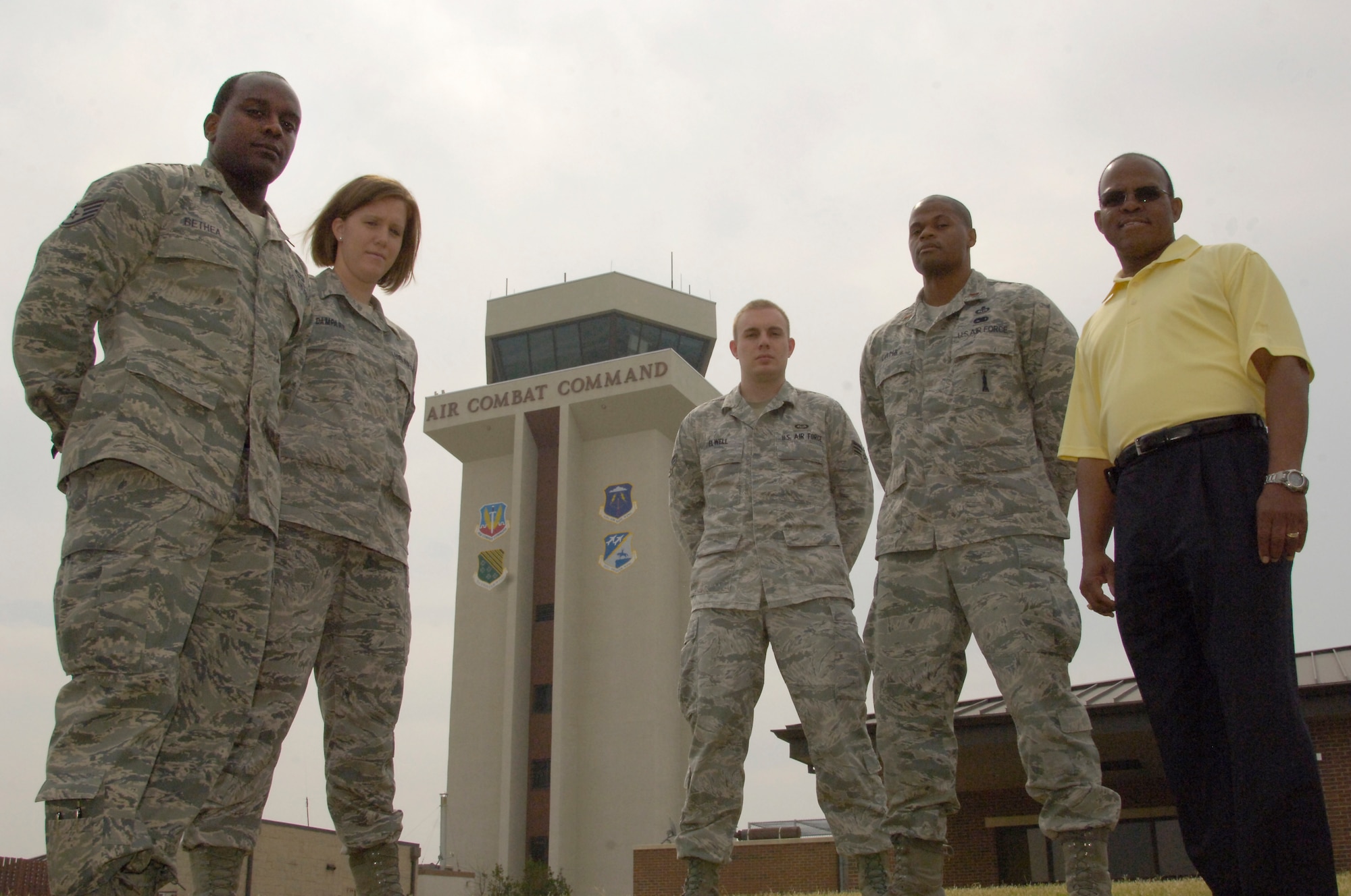 Staff Sgt. Andrew Bethea, Senior Airman Anna Dampare, SrA Nick Elwell, 2nd Lt. Rashid Lamb and Greg Green, 1st Operations Support Squadron weather forecasters, stand ready at Langley Air Force Base, Va., to provide critical information to pilots flying missions anywhere in the region. The 1st OSS Weather Flight continuously monitors sea-states and weather data across the region though RADAR, satellite, airfield equipment and real-time weather observations. (U.S. Air Force photo by Tech. Sgt. Randy Redman)