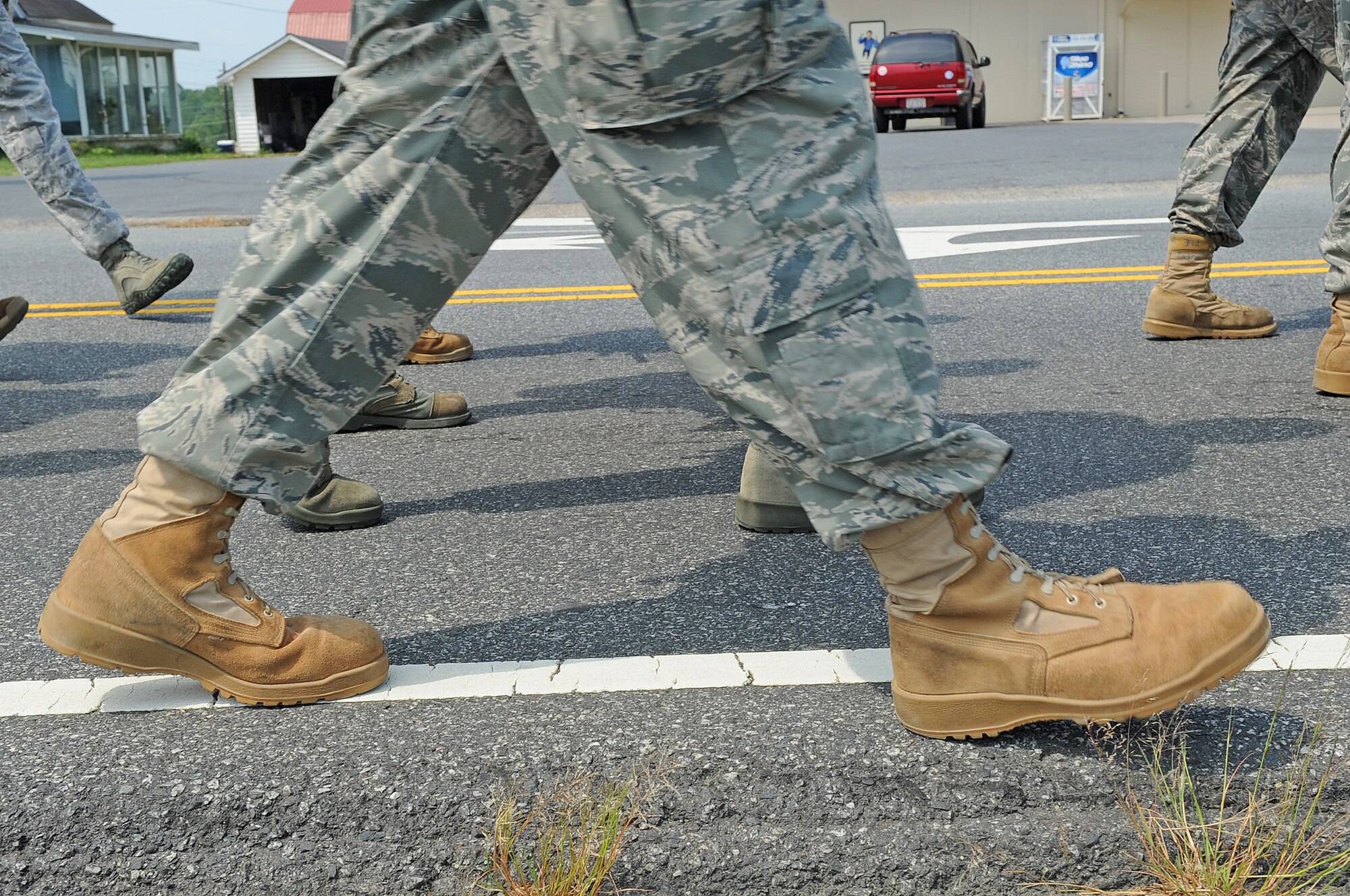 SEYMOUR JOHNSON AIR FORCE BASE, N.C. - Airmen from the 4th Security Forces Squadron march during their leg of the 9/11 Ruck March to Remember, Aug. 21, 2011. The march began at Lackland Air Force Base, Texas and consists of 15 security forces squadrons covering 2,182 miles to ground zero in New York. (U.S. Air Force photo by Senior Airman Gino Reyes/Released)