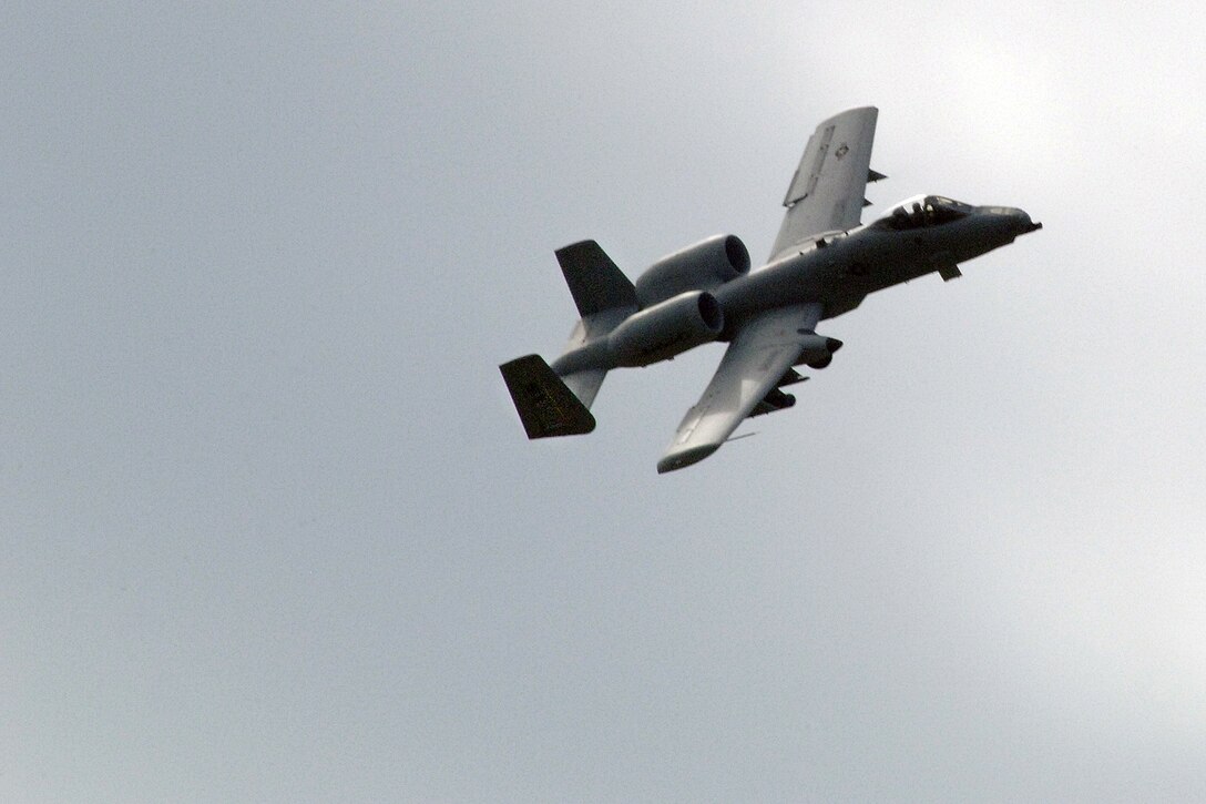 An A-10 Thunderbolt II aircraft pass overhead during the 2011 Selfridge Air Show and Open House at Selfridge Air National Guard Base, Mich., Aug. 20, 2011. The A-10’s are flown by the 107th Fighter Squadron at Selfridge. (USAF photo by John S. Swanson)