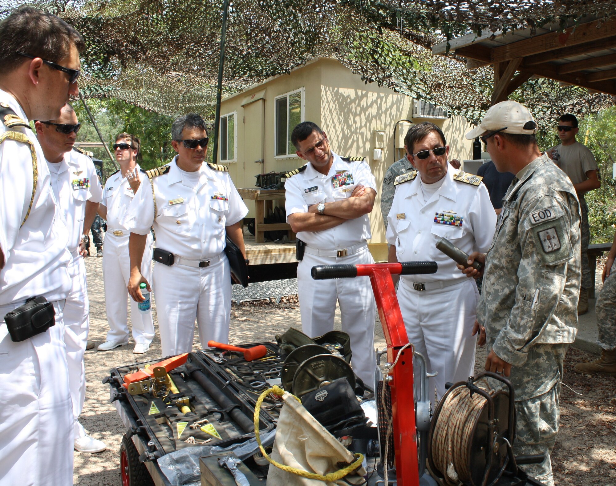 The Colombian Navy Chief of Naval Operations, Admiral Alvaro Echandia, visited the Naval School Explosive Ordnance Disposal here Aug. 19. Navy Capt. Joseph Polanin, commanding officer of NAVSCOLEOD escorted the Admiral andd his staff on a tour of NAVSCOLEOD facilities. (courtesy photo)