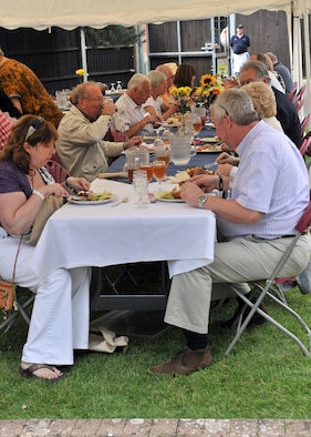 RAF MILDENHALL, England – Base members and local British community leadership enjoy a Tex-Mex style lunch at the New Mayor’s Barbecue here Aug. 20, 2011.  The event began with a mission brief, followed by a line dancing demonstration and concluded with lunch. (U.S. Air Force photo/Staff Sgt. Tabitha M. Lee)