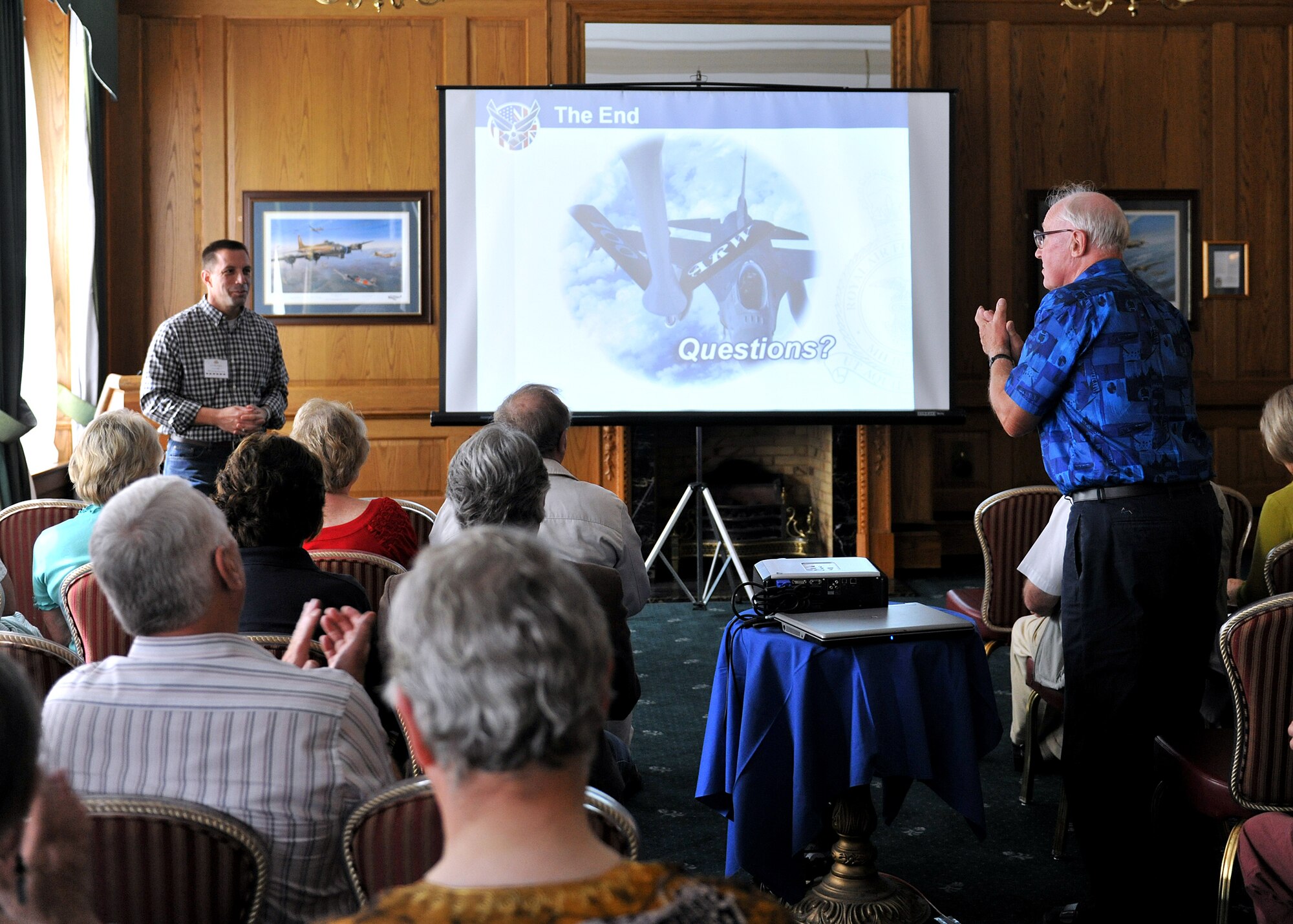 RAF MILDENHALL, England – Councillor John Powley (right), Chairman of Cambridgeshire County Council, thanks Col. Christopher Kulas, 100th Air Refueling Wing commander, for providing a briefing on the base's mission here Aug. 20, 2011, during the New Mayor’s Barbecue. The briefing included RAF Mildenhall history, the current air refueling mission and an overview of the tenant units’ missions. (U.S. Air Force photo/Staff Sgt. Tabitha M. Lee)