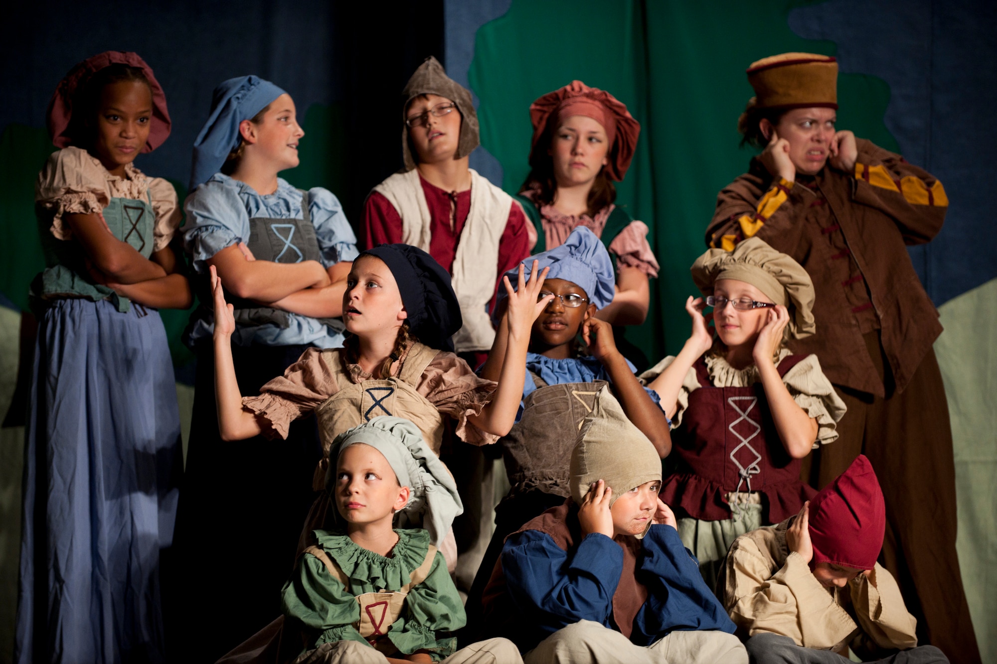 The cast of "King Arthur's Quest" performs Aug. 20, 2011, at the community center at Incirlik Air Base, Turkey. Sixty-four children from the base participated in the play put on by the Missoula Children's Theatre. The theatre visits a variety of public venues to include most stateside and several overseas military installations to teach children about the performing arts. (U.S. Air Force photo by Tech. Sgt. Michael B. Keller/Released)