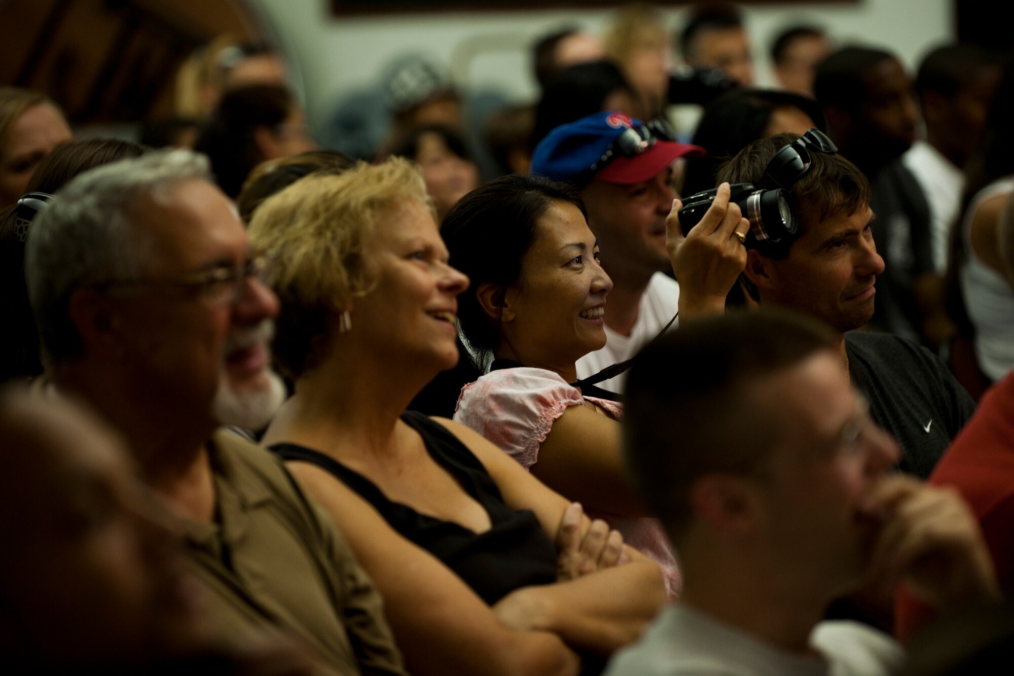 An audience watches a performance of "King Arthur's Quest" Aug. 20, 2011, at the community center at Incirlik Air Base, Turkey. Sixty-four children from the base participated in the play put on by the Missoula Children's Theatre. The theatre visits a variety of public venues to include most stateside and several overseas military installations to teach children about the performing arts. (U.S. Air Force photo by Tech. Sgt. Michael B. Keller/Released)