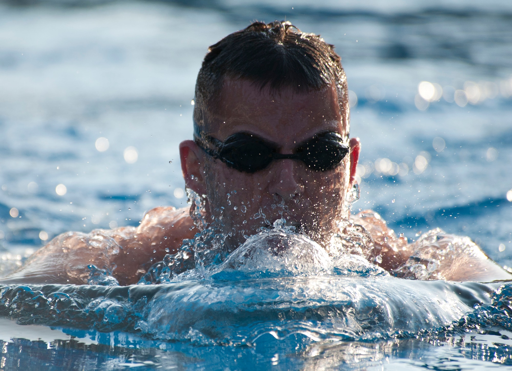 A swimmer participates in the 225-meter swim portion of the 3rd Annual Sprint Triathlon Aug. 20, 2011, at Incirlik Air Base, Turkey. The triathlon also included a five-kilometer run and a 20-kilometer bike ride.(U.S. Air Force photo by Airman 1st Class Clayton Lenhardt/Released)