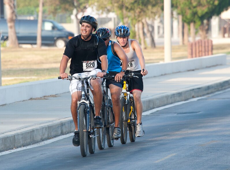Robert Verdugo, 39th Communications Squadron, leads a group of bikers while competing in the 20-kilometer bike ride portion of the 3rd Annual Sprint Triathlon Aug. 20, 2011, at Incirlik Air Base, Turkey. The triathlon also included a five-kilometer run and a 225-meter swim.(U.S. Air Force photo by Airman 1st Class Clayton Lenhardt/Released)
