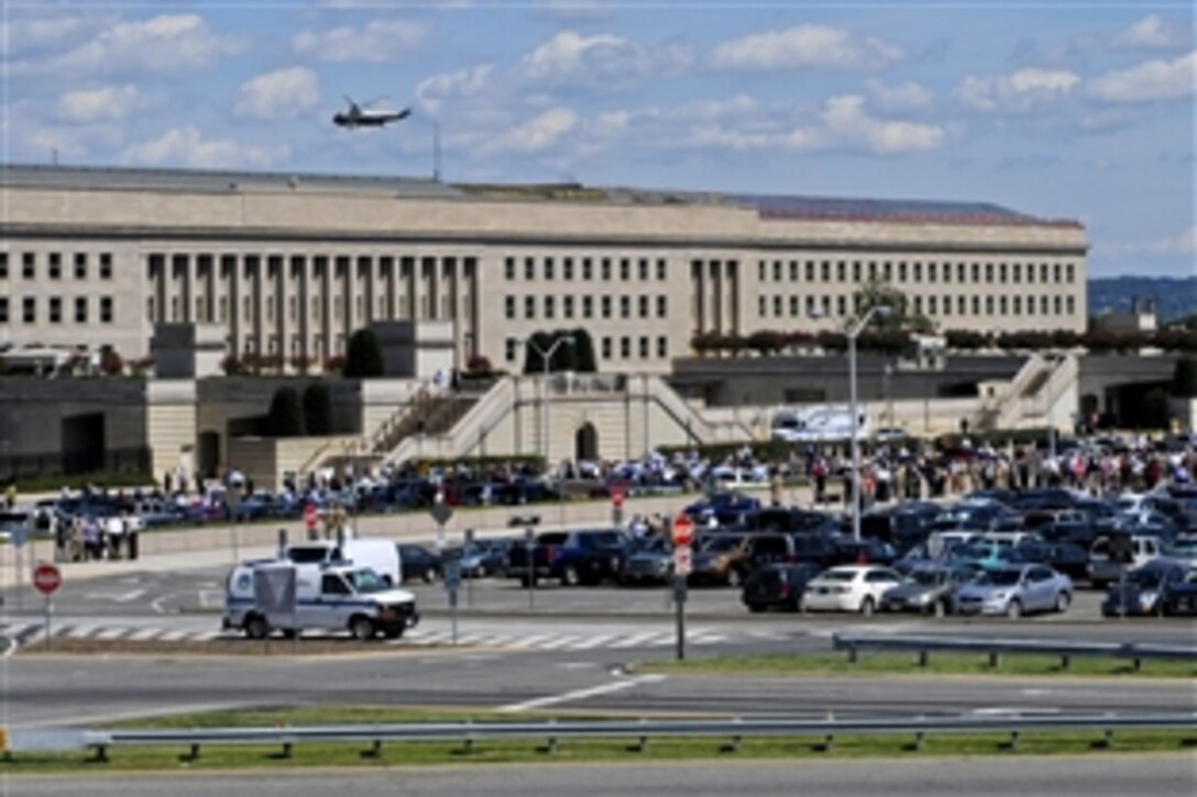 Civilians and military personnel evacuate the Pentagon after a 5.9 magnitude earthquake centered in Mineral, Va., shook areas along the East Coast, Aug. 23, 2011.