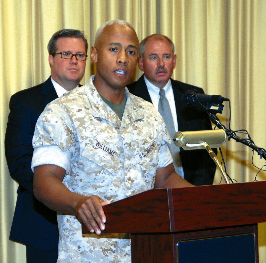 Col. Terry V. Williams, commanding officer, Marine Corps Logistics Base Albany, conducts a press conference in Building 3500, Aug. 24, and discusses a yearlong narcotics investigation, which led to the arrest of nine current and former civilian employees. Williams said the Marine Corps has a zero tolerance policy on illegal drug activity.