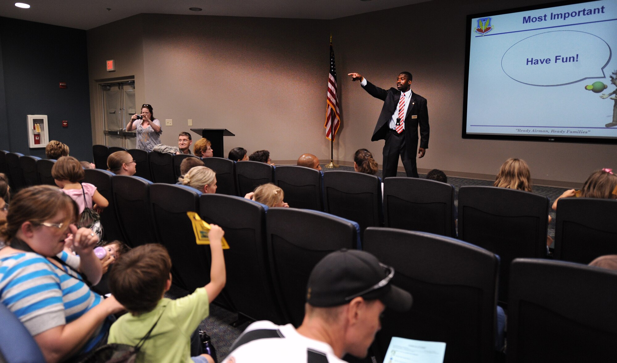 John Kennedy, 20th Force Support Squadron school liaison officer, briefs the children participating in the Operation Take-Flight at the deployment processing center at Shaw Air Force Base, S.C. Aug. 24, 2011. Operation Take-Flight gives children a chance to experience what processes their parents go through prior to deployments. (U.S. Air Force photo/Airman 1st Class Tabatha L. Duarte)(Released)
