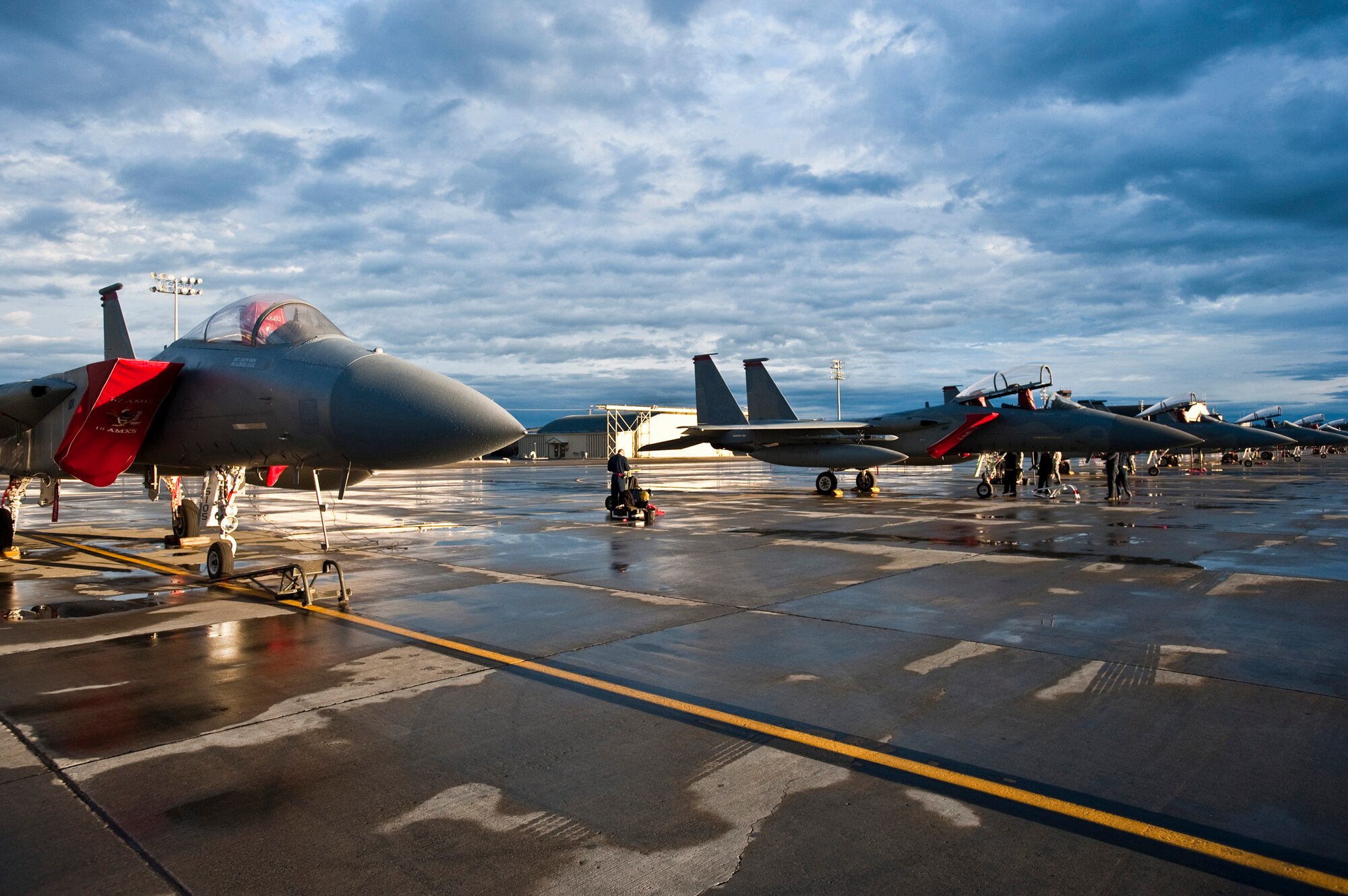 JOINT BASE ELMENDORF-RICHARDSON, Alaska -- Several F-15 Eagles sit on JBER?s flight line during the early morning of Aug. 18. Approximately 150 Airmen and 10 jets from Kadena Air Base, Okinawa, Japan traveled to Alaska earlier in the month to participate in Red Flag-Alaska 11-3, which runs from Aug. 15 through 26. (U.S. Air Force photo/Senior Airman Christopher Gross)