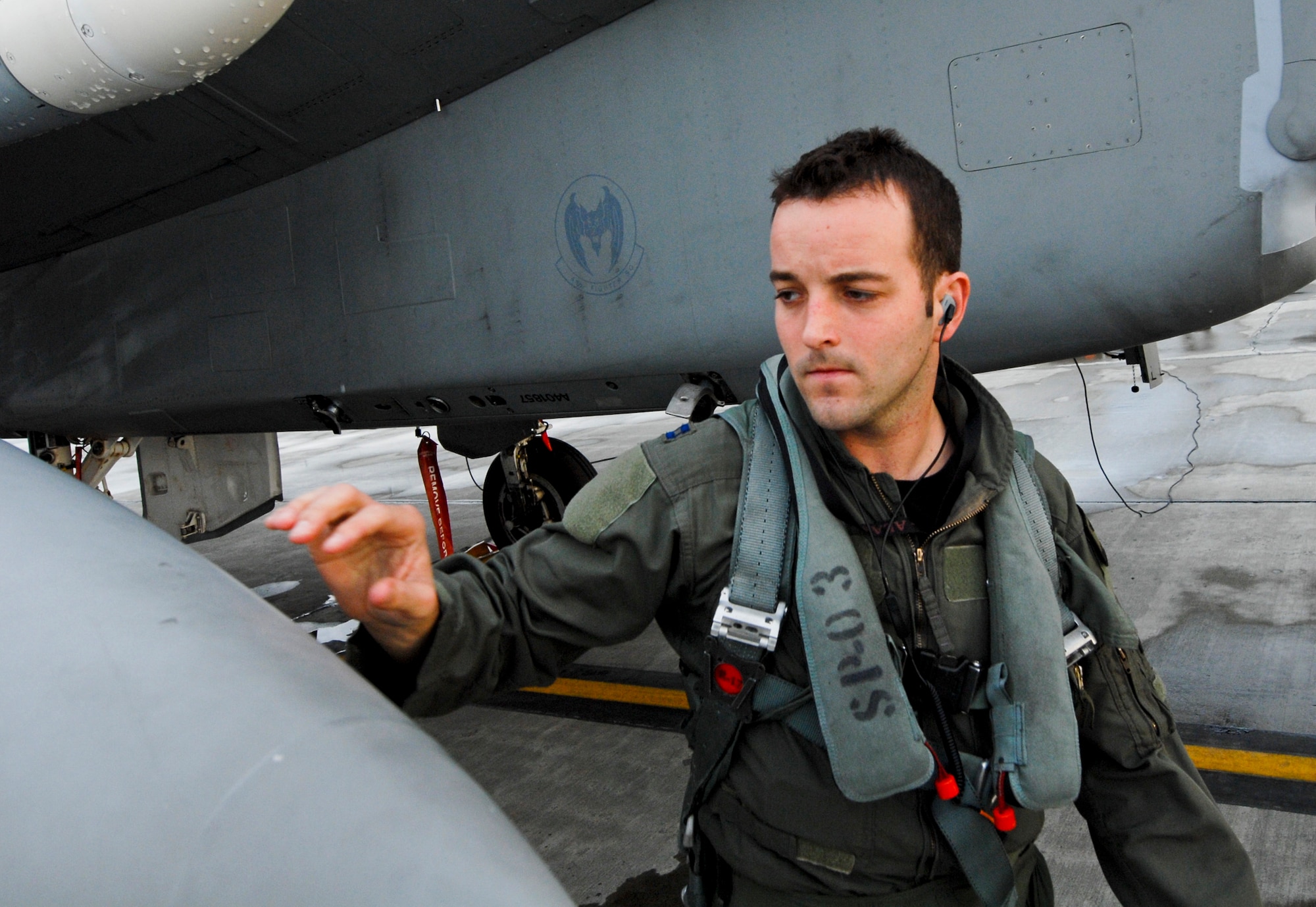 JOINT BASE ELMENDORF-RICHARDSON, Alaska -- Capt. Brett Vanderpas, 67th Fighter Squadron, goes through his pre-flight inspection of an F-15 Eagle Aug. 18. Vanderpas and about 150 other Airmen from Kadena Air Base, Okinawa, Japan, arrived at JBER earlier this month to participate in Red-Flag Alaska 11-3 which runs from Aug. 15 through 26. (U.S. Air Force photo/Senior Airman Christopher Gross)