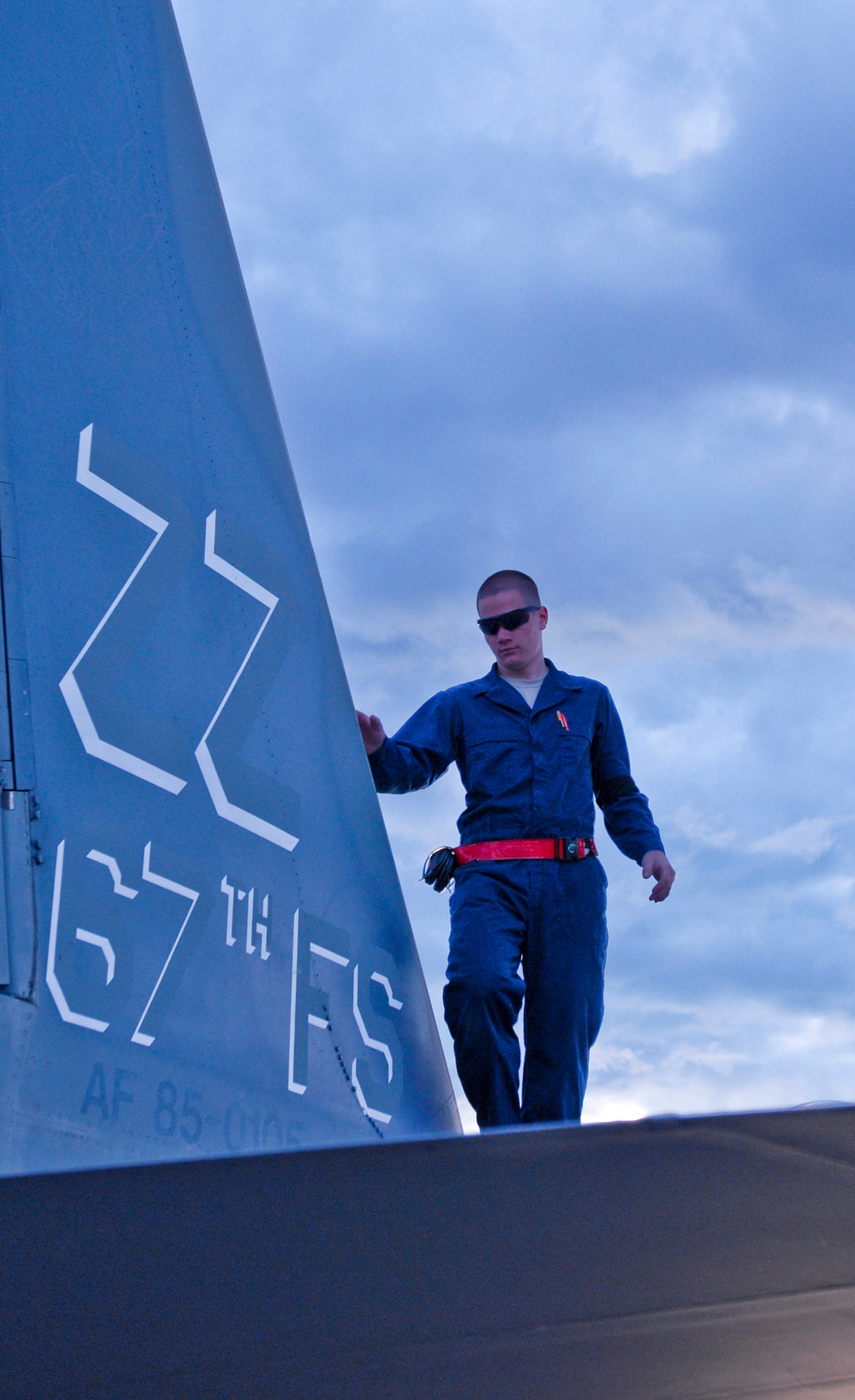 JOINT BASE ELMENDORF-RICHARDSON, Alaska -- Airman 1st Class Michael Atherton, 18th Aircraft Maintenance Squadron, goes through his pre-flight inspection of an F-15 Eagle Aug. 18. Atherton and about 150 other Airmen from Kadena Air Base, Okinawa, Japan, arrived at JBER earlier this month to participate in Red-Flag Alaska 11-3 which runs from Aug. 15 through 26. (U.S. Air Force photo/Senior Airman Christopher Gross)