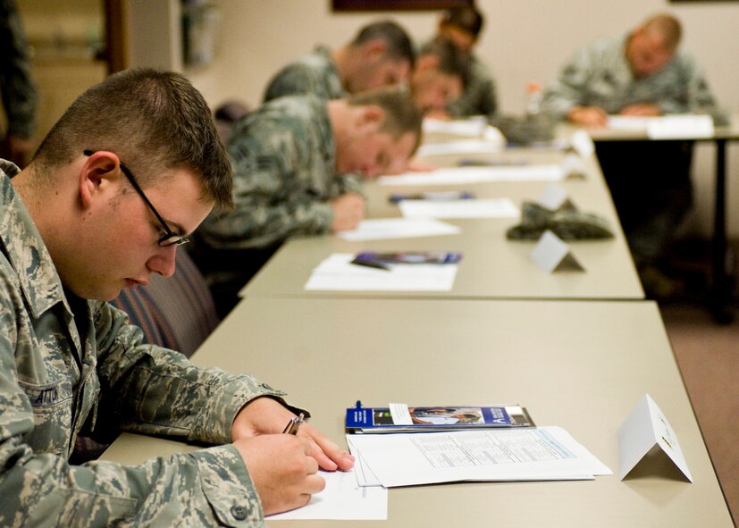 Airmen take an overview test on the first day of the Professional Airmen Seminar at Ellsworth Air Force Base, S.D., Aug. 16, 2011. The three-day course is designed to bridge the gap between the First Term Airman’s Course and Airman Leadership School. (U.S. Air Force photo/Airman Alystria Maurer/Released)