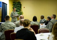 Capt. Bradley Harrelson, 28th Medical Dental Operations Squadron general dentist, welcomes area dentists attending the Ellsworth Air Force Base Dental Seminar at Ellsworth Air Force Base, S.D., Aug. 18, 2011. During the two-day seminar, dentists heard from Dr. Raymond Gist, the president of American Dental Association, toured a B-1B Lancer, and visited several facilities on base. (U.S. Air Force photo/Airman Alystria Maurer/Released)