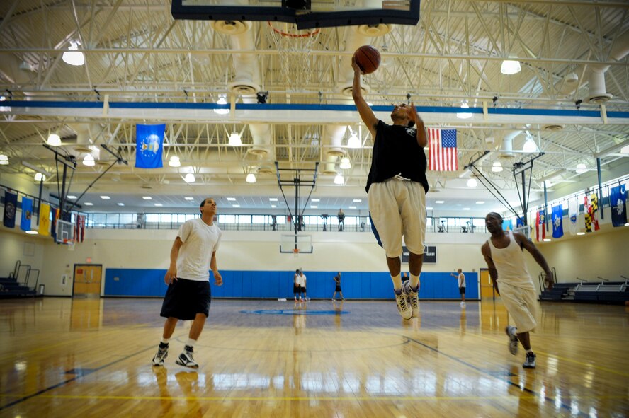 Verone Shelton, 824th Base Defense Squadron, attempts a lay-up during the Moody Air Force Base varsity basketball team tryouts at the Freedom I Fitness Center, Aug. 23, 2011. Shelton and fellow team members are participating in a three-day tryout to see if they have the skills needed to play on the base team. (U.S. Air Force photo by Staff Sgt. Joshua J. Garcia/Released)