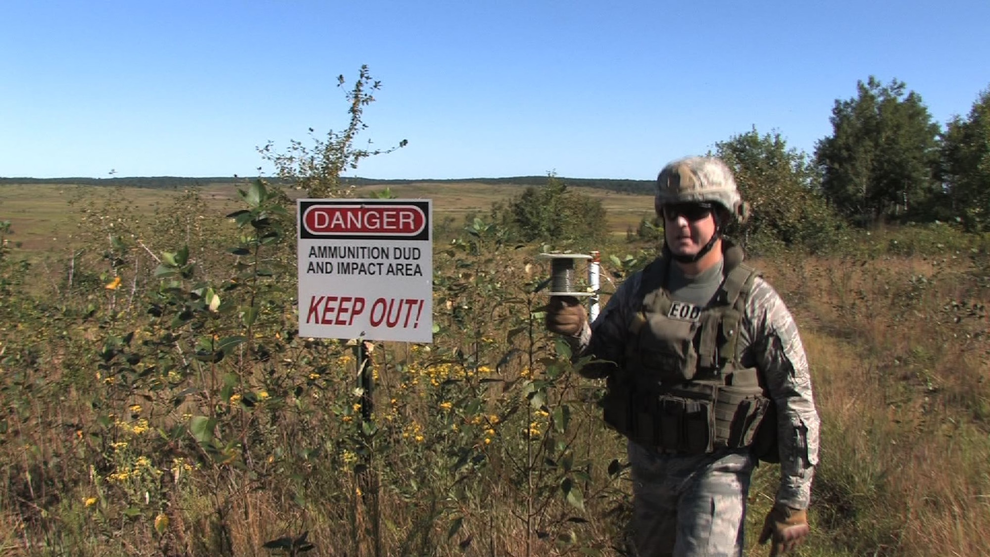 Master Sgt. Scott Castleman, Explosive Ordnance Disposal superintendent and Staff Sgt. Nathan Lentsch, EOD craftsman responded to Camp Ripley Aut. 17 to dispose of a 122mm projectile mortar round that failed to explode.  They safely detonated the device rendering it harmless. (Air Force Photo/Wendy Cormier)