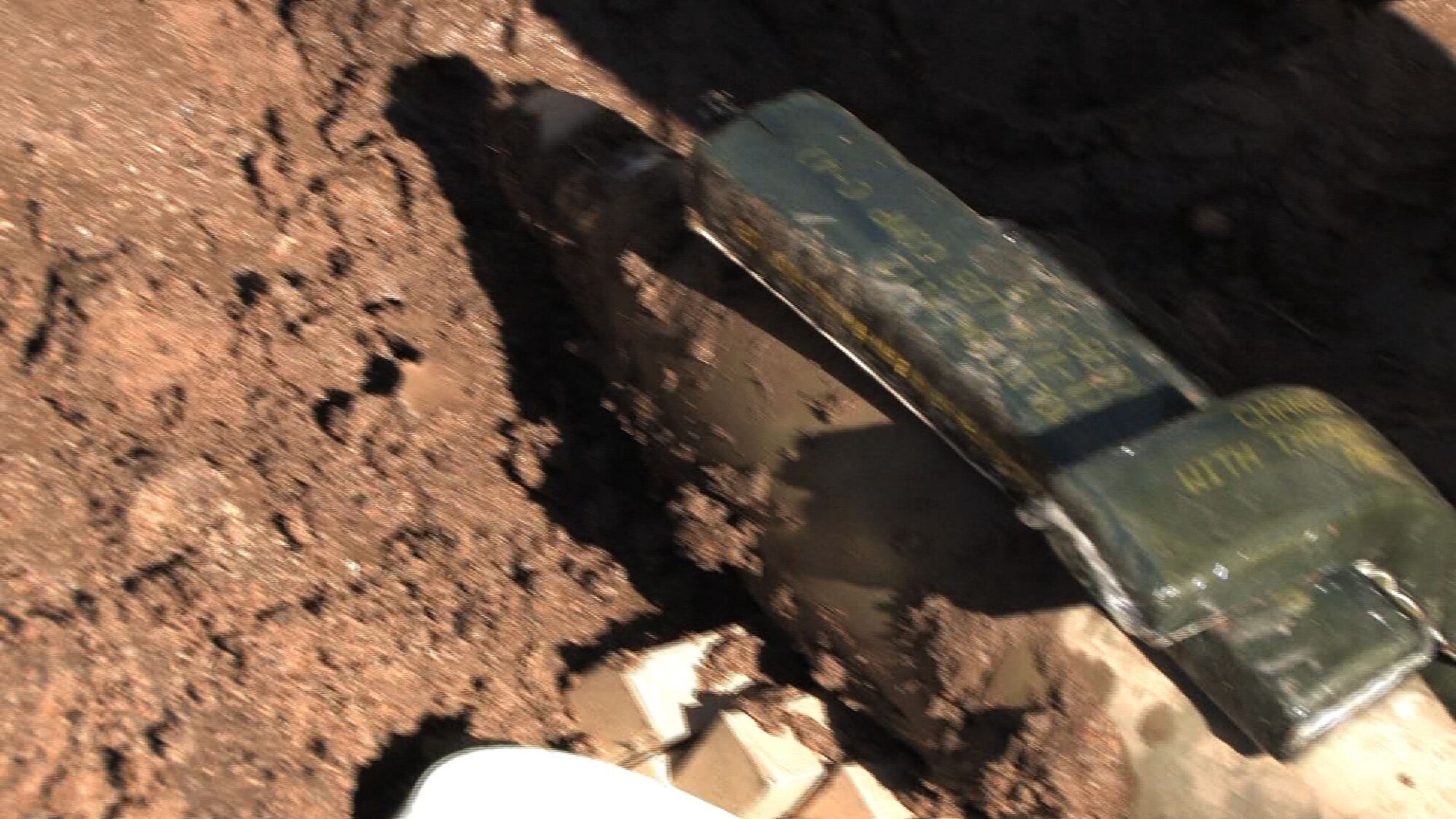 Master Sgt. Scott Castleman, Explosive Ordnance Disposal superintendent and Staff Sgt. Nathan Lentsch, EOD craftsman responded to Camp Ripley Aut. 17 to dispose of a 122mm projectile mortar round that failed to explode.  They safely detonated the device rendering it harmless. (Air Force Photo/Wendy Cormier)