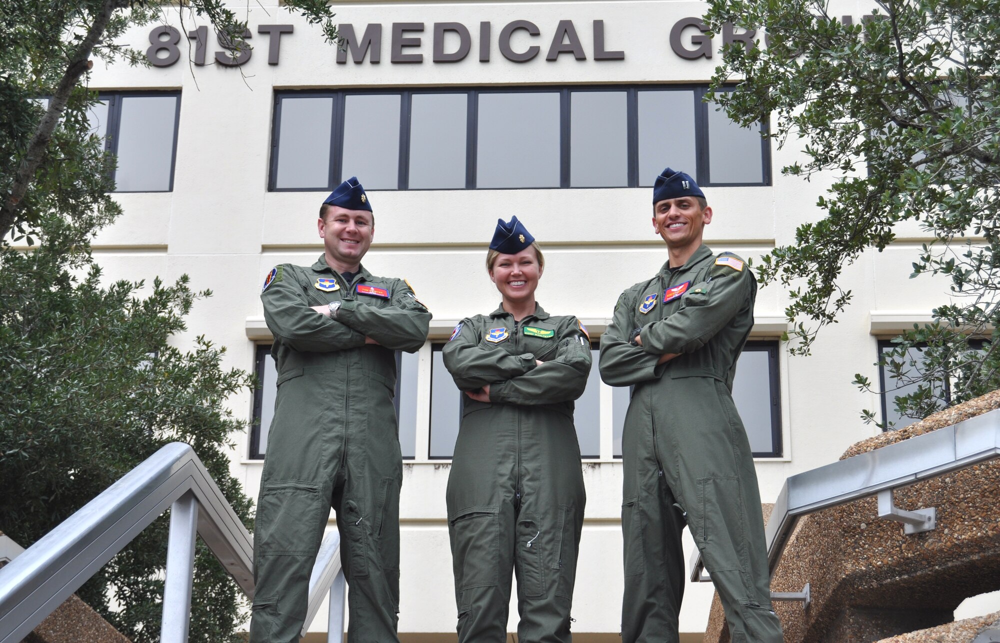 From left, Majs. (Drs.) Tom Paynter and Wendi Wohltmann and Capt. (Dr.) Robert Henley, Keesler flight surgeons, have been rotating through the 14th Medical Group medical facility at Columbus as part of Air Education and Training Command’s unique regional physician exchange program. Paynter is the 81st Surgical Operations Squadron’s chief of orthopedic surgery, Wohltmann is the 81st Medical Operations Squadron chief of dermatology and Henley is an 81st Aerospace Medicine Squadron flight surgeon who plans to train in ophthalmology in his next assignment.  (U.S. Air Force photo by Steve Pivnick)