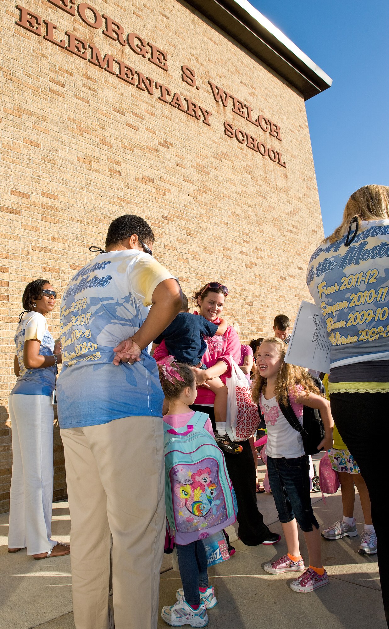 Students arrive at George S. Welch Elementary School on Dover Air Force Base, Del., for the first day of school Aug. 24, 2011.  Motorists on base are asked to keep an eye out for children walking to and from school.  (U.S. Air Force photo by Roland Balik) 