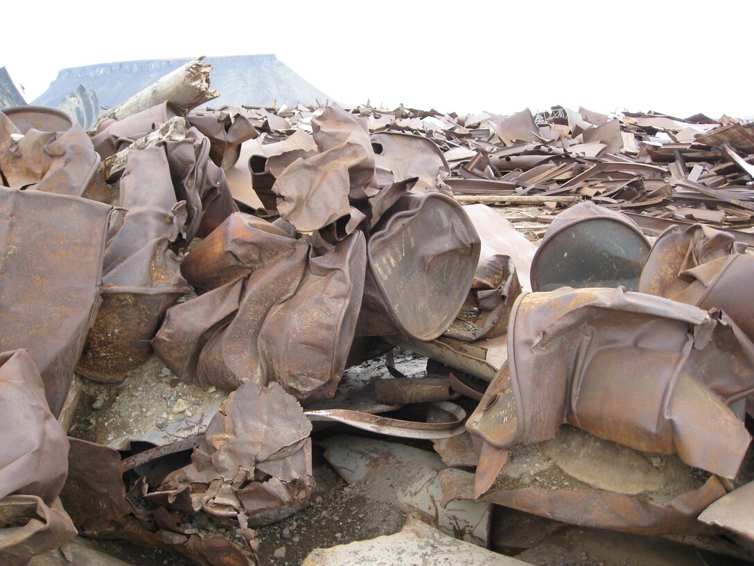 Piping, fuel tanks and other scrap metal weighing more than 15,000 tons had accumulated at Thule AB during the last 15 years. An increase in scrap metal prices allowed a recycling project that netted the base a check for more than $1 million, as a recycling company came in and hauled the scrap off the island. (U.S. Air Force photo/Todd DeGarmo)