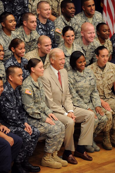 YOKOTA AIR BASE, Japan -- Vice President Joe Biden poses for a group photo with servicemembers at the Taiyo Community Center, Yokota Air Base, Japan, Aug. 24, 2011. Approximately 1,000 servicemembers from the U.S. Air Force, Army, Marines, Navy and Coast Guard attended the Vice President's speech, in which he thanked them for their efforts during Operation Tomodachi. (U.S. Air Force photo/Staff Sgt. Stacy Moless)