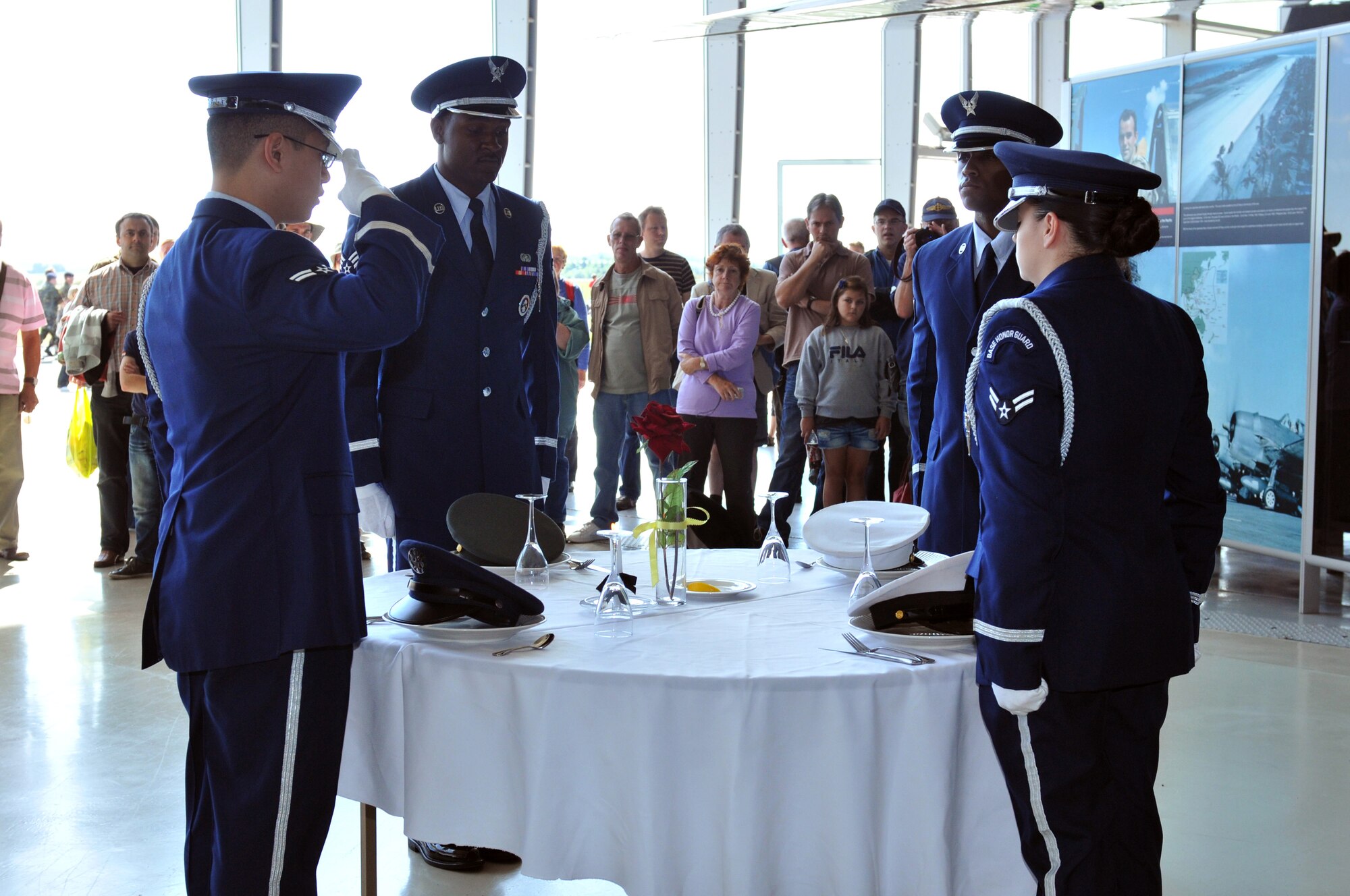 CAMBRIDGESHIRE, England – The 48th Fighter Wing Honor Guard remembers prisoners of war and servicemembers missing in action during American Air Day at the Imperial War Museum Duxford, Aug. 19, 2011. The American Air Day provided the local community the opportunity to see what U.S. Air Force members stationed in England do on a daily basis.  The day comprised a mix of flying and ground-based activities that featured aircraft and personnel from RAFs Lakenheath and Mildenhall, which included an F-15 and KC-135 flyover. (U.S. Air Force photo/Senior Airman Lausanne Morgan)