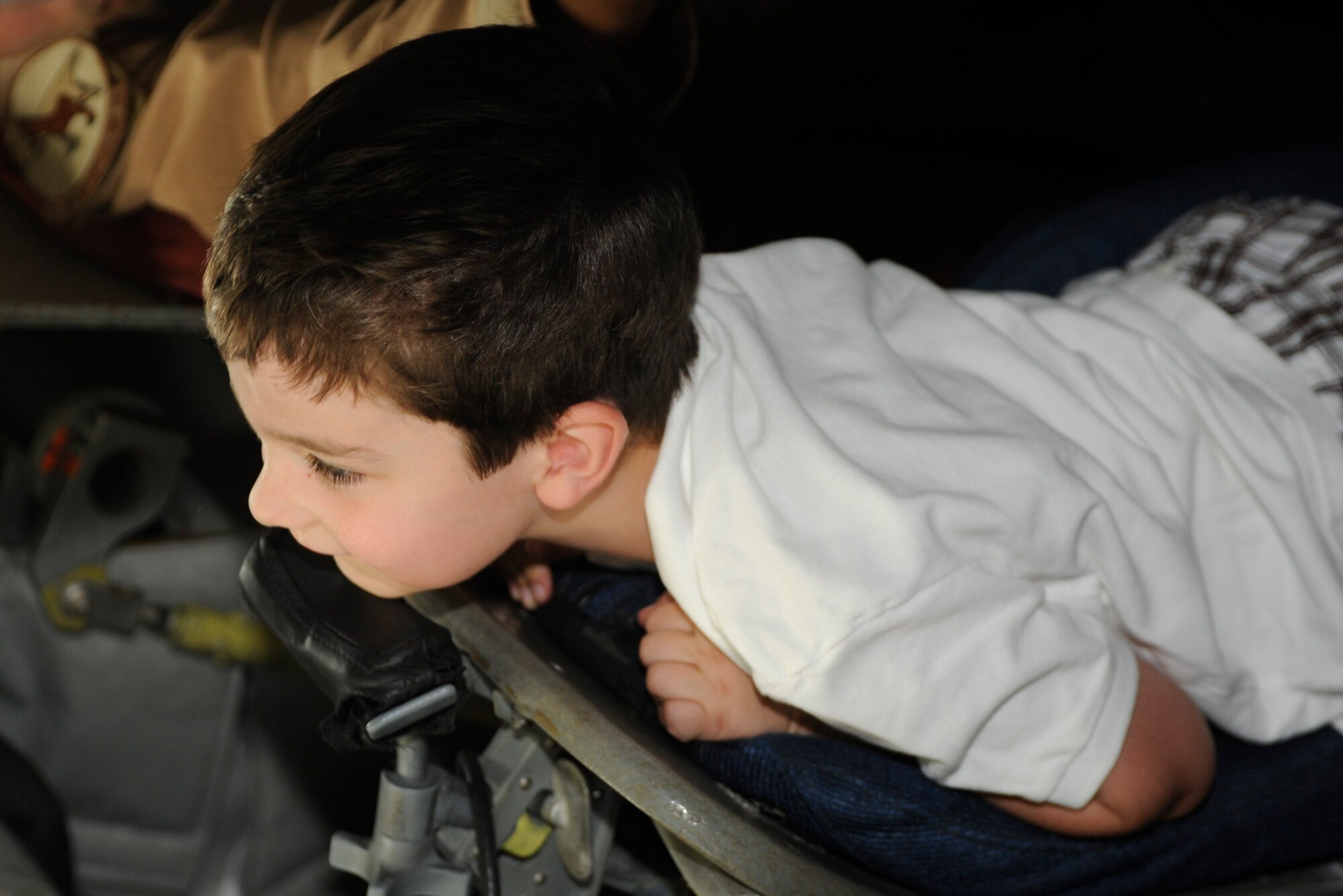 Graham Manning, 5, looks out the KC-135 Stratotanker boom window during a U.S. Embassy Family Day tour of the Transit Center at Manas, Kyrgyzstan, Aug. 20. (U.S. Air Force photo/Tech. Sgt. Tammie Moore)