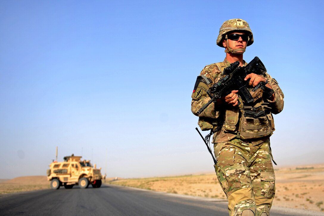 U.S. Army Sgt. Brandon Bregel prepares to clear a bridge during a bridge quality assurance inspection along Highway 1 in Zabul province, Afghanistan, Aug. 22, 2011. Bregel is assigned to the Provincial Reconstruction Team Zabul's security force and is deployed from the Massachusetts National Guard.