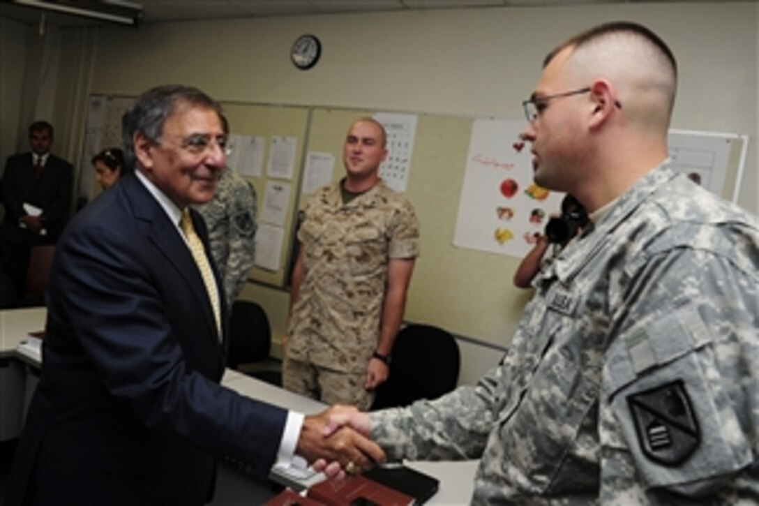 Defense Secretary Leon E. Panetta visits students assigned to the Defense Language Institute Foreign Language School and Presidio of Monterey, Calif., Aug. 23, 2011.  Panetta attended a student demonstration of the cutting-edge language technology that the school utilizes. 