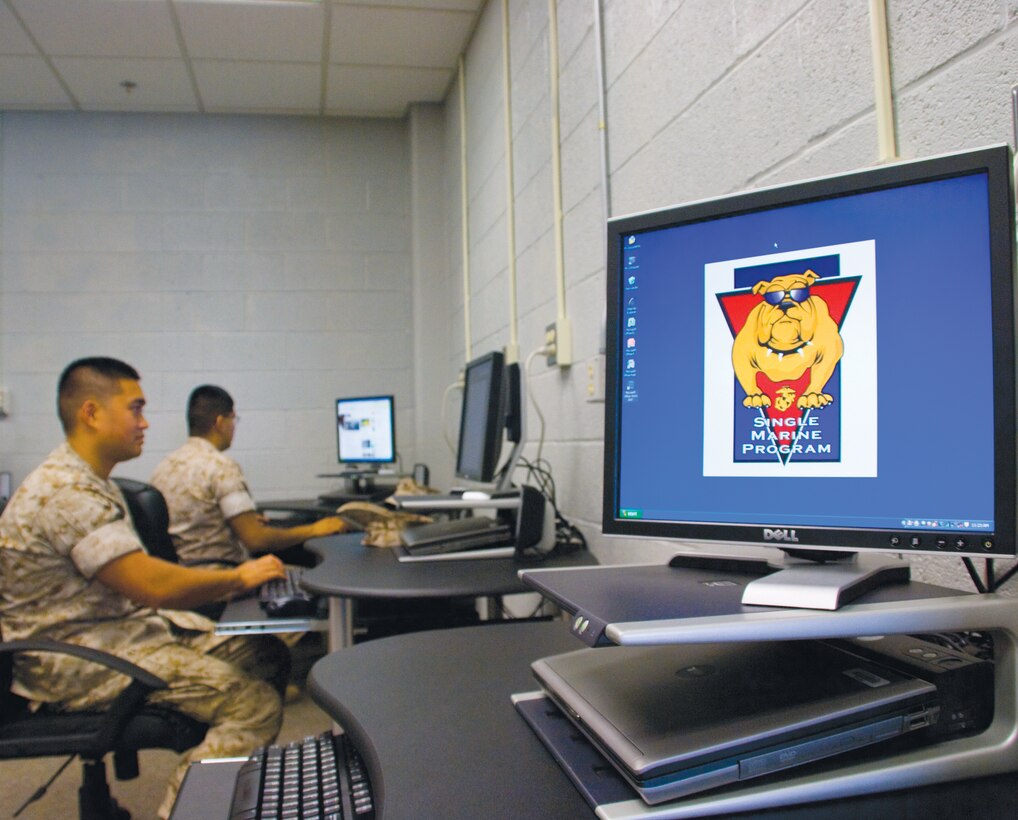 Marines use computers in the Single Marine Program Recreation Center for education and to stay in contact with family members.