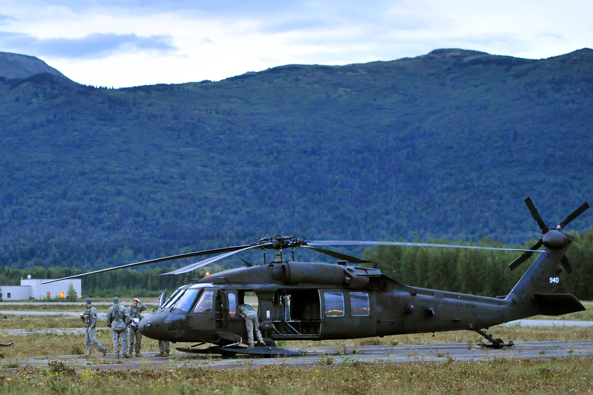 Soldiers of 6th Eng. Bn. load a UH-60 Black Hawk, Aug. 17, enroute to the Order of the Arctic Sapper competition. (U.S. Air Force photo/Justin Connaher)