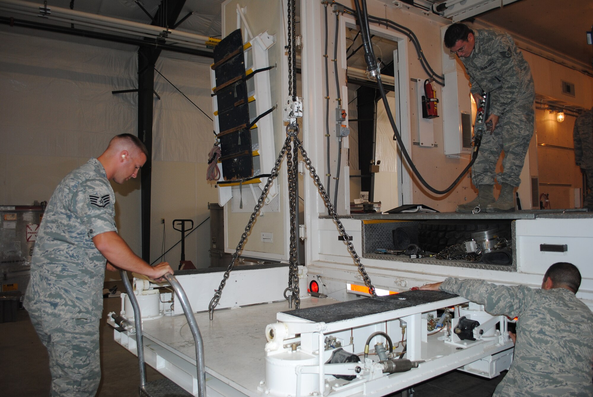 Members of the missile maintenance team follow the proper procedures for a pre- operational checkout while being timed in preparation for the Global Strike Challenge.