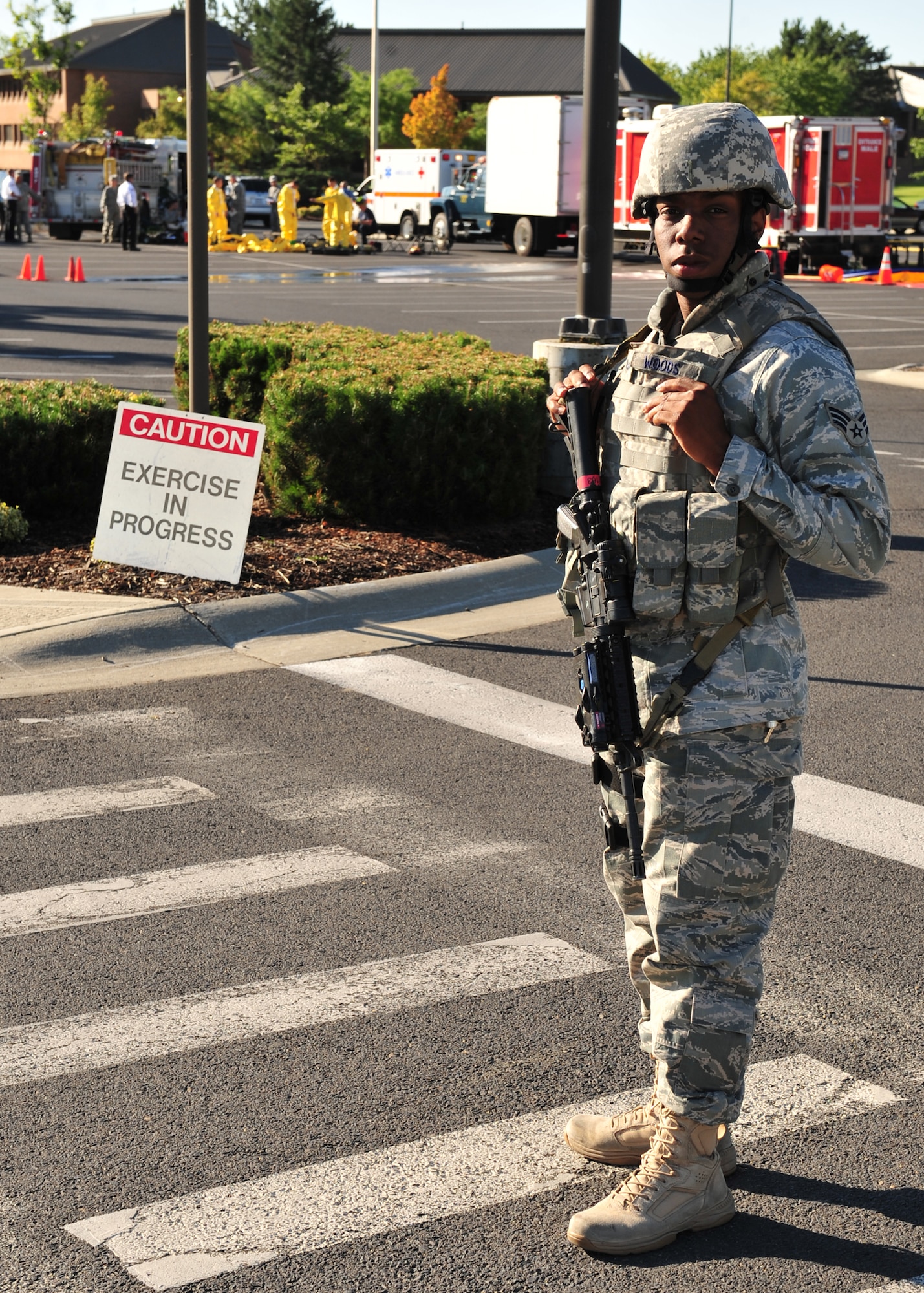Senior Airman Michael Wood, 92nd Security Forces Squadron, provides security during the first-ever disease containment plan base exercise at Fairchild Aug 17. (U.S. Air Force photo/Staff Sgt. Michael Means)