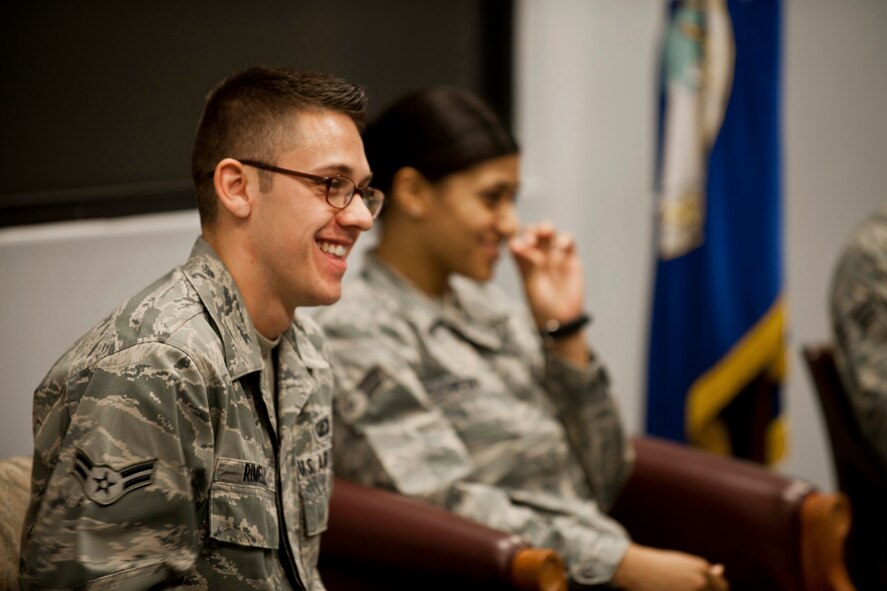 U.S. Air Force Airman 1st Class Lee Rimell, 23rd Comptroller Squadron pay technician, shares a smile while answering a question during a senior NCO enhancement seminar at Moody Air Force Base, Ga., Aug. 25, 2011. Rimell was part of a panel of three Airmen who gave their thoughts on leadership and what they’ve experienced so far as junior Airmen. (U.S. Air Force photo by Staff Sgt. Jamal D. Sutter/Released)