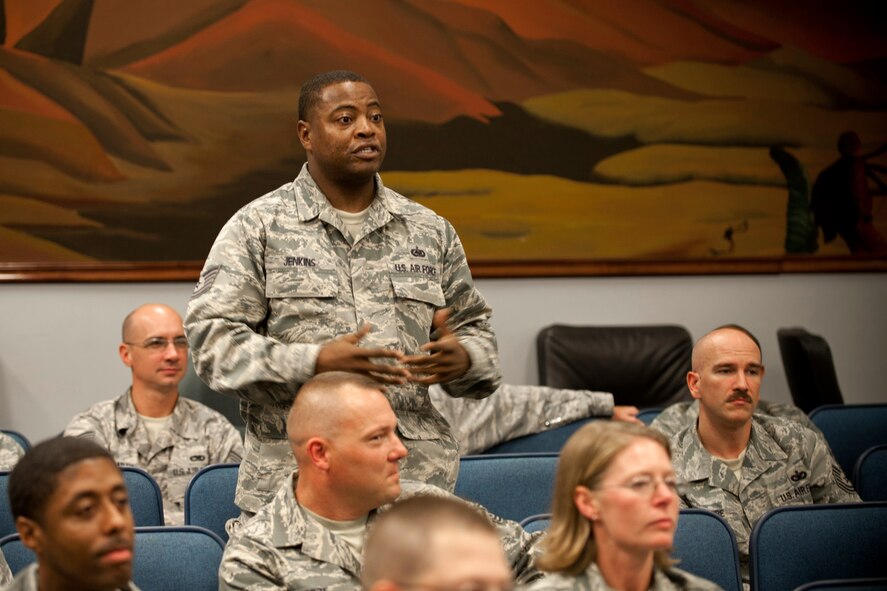 U.S. Air Force Tech. Sgt. Quetonius Jenkins, 23rd Logistics Readiness Squadron facilities NCO in charge, asks a question to a panel during a senior NCO enhancement seminar at Moody Air Force Base, Ga., Aug. 25, 2011. The panel consisted of two airmen first class and a senior airman. Jenkins asked the Airmen to share their perspective on what they expected out of their leadership. (U.S. Air Force photo by Staff Sgt. Jamal D. Sutter/Released)
