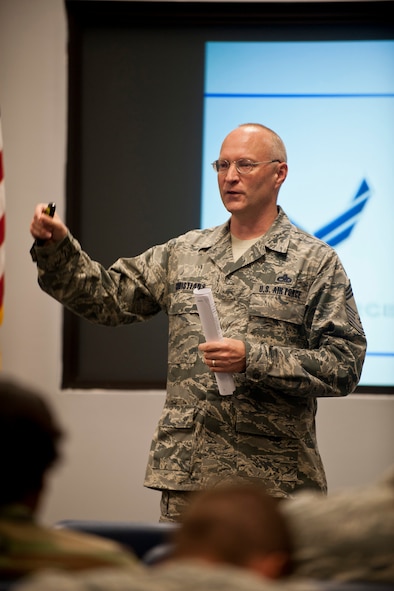 U.S. Air Force Chief Master Sgt. Corey Christians, 23rd Equipment Maintenance Squadron superintendent, introduces himself during a senior NCO enhancement seminar brief at Moody Air Force Base, Ga., Aug. 25, 2011. During the brief, Christians spoke about Air Force enlisted heritage. (U.S. Air Force photo by Staff Sgt. Jamal D. Sutter/Released)
