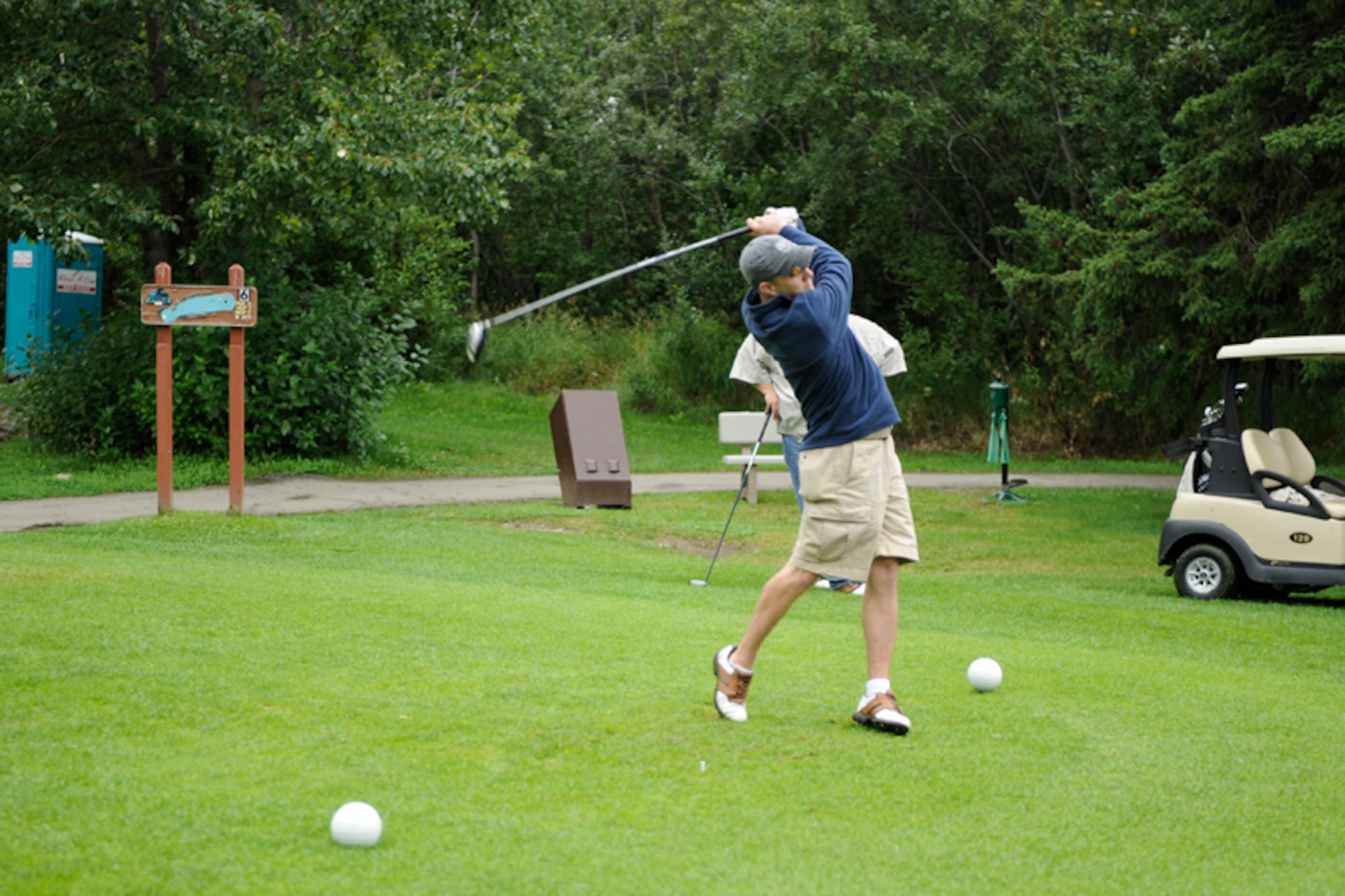 Hollis Darby, of C Company, 307th Signal Battalion, tees off during the Joint Base Elmendorf-Richardson annual golf tournament held at the Moose Run Golf Course Tuesday through Thursday. Many golfers turned out to battle for trophies, despite overcast weather on Tuesday. (U.S. Air Force photo/Steven White) 