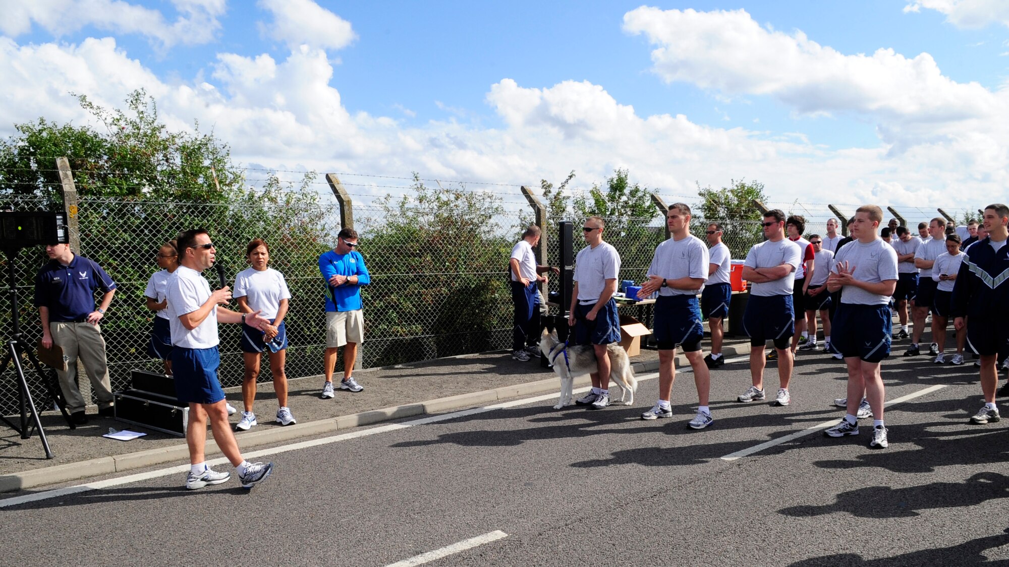 RAF MILDENHALL, England – Col. Christopher Kulas, 100th Air Refueling Wing commander, gives a quick   safety briefing before the monthly wing run at RAF Mildenhall, England Aug. 25, 2011. Hundreds of Airmen took part in the 5K event, which is held monthly to promote health and fitness. (U.S. Air Force photo/Senior Airman Ethan Morgan)