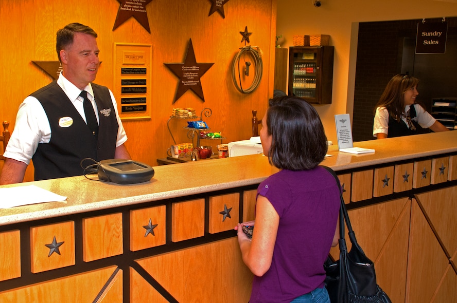 LAUGHLIN AIR FORCE BASE, Texas – Laughlin Manor manager, Ronald Wolshlager, attends to a guest here Aug. 24. Recently, the manor was awarded the Air Education and Training Command’s Best Innkeeper’s Award. The award has been given annually for years to Air Force lodging facilities that provide the most outstanding lodging and customer service to the Air Force traveler. (U.S. Air Force photo/Senior Airman Scott Saldukas)