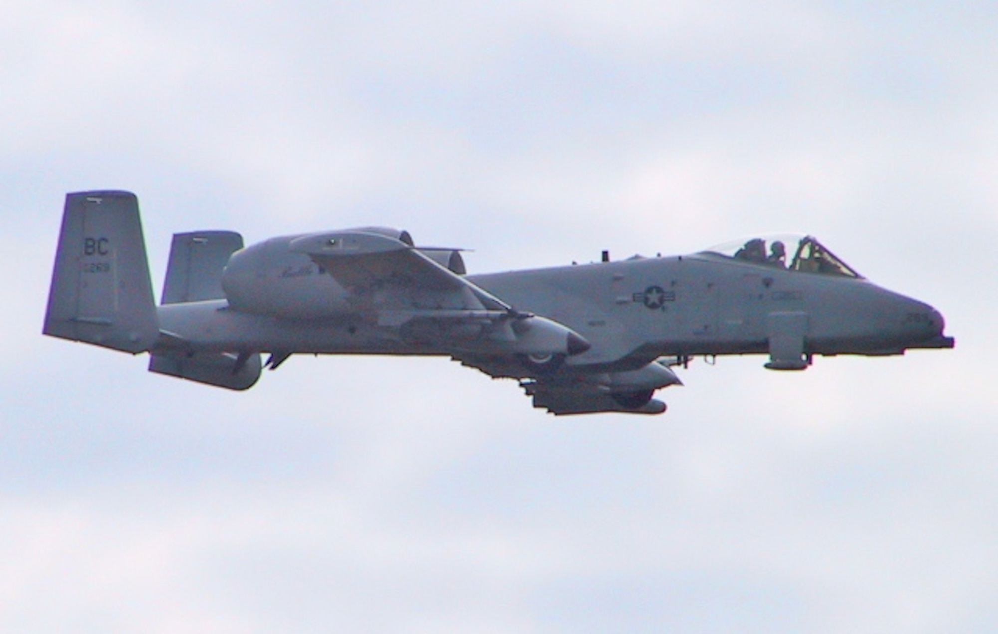 An A-10 Bomber flies over Grayling Air Gunnery Range as he prepares to complete a bombing mission.