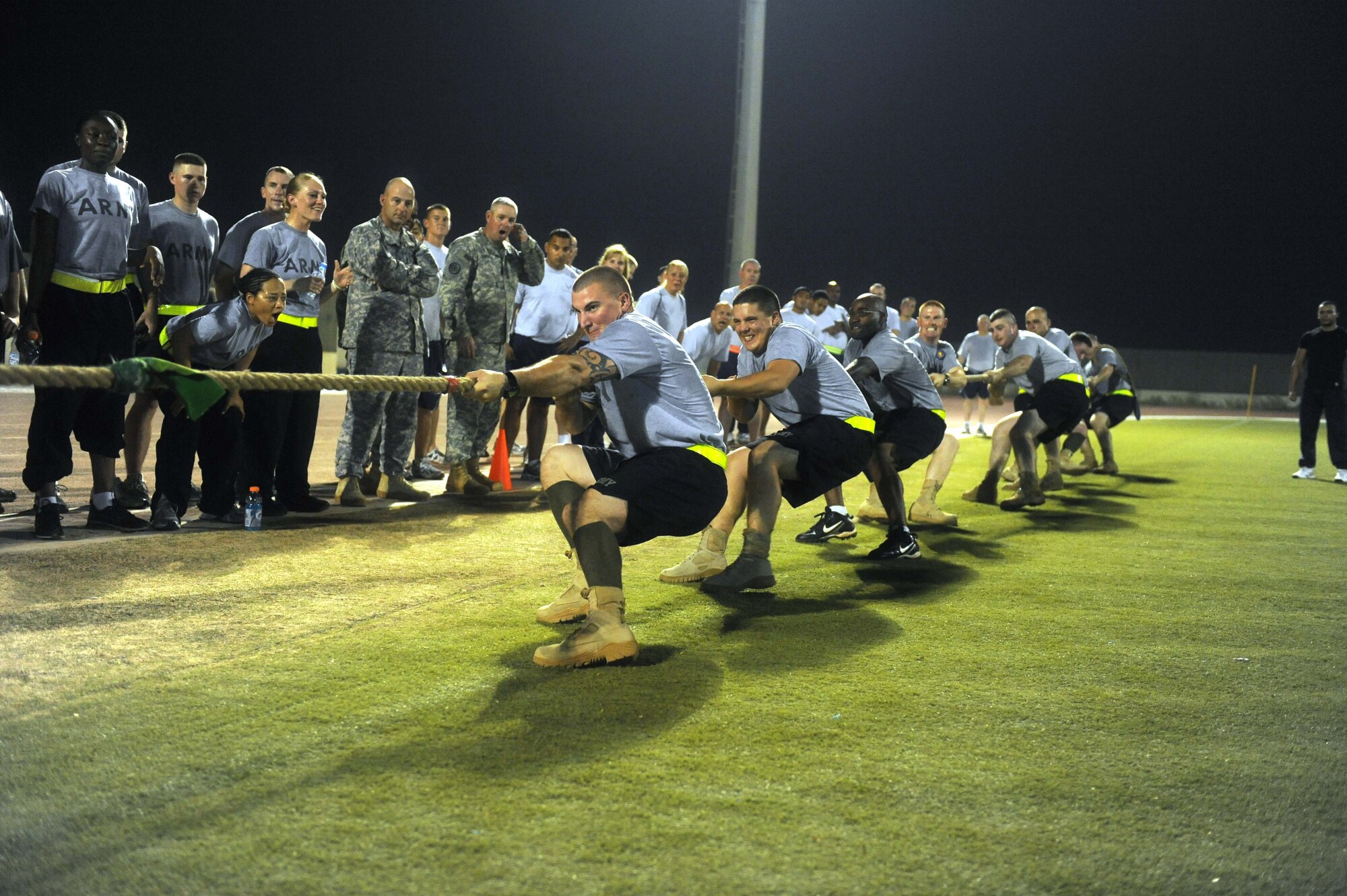 Members of the U.S. Army?s 3rd Battalion, 4th Air Defense Artillery Regiment compete in a tug o? war competition during the first week of the Ramadan games Aug. 7-10 at the 380th Air Expeditionary Wing.  The Ramadan Games is an annual sporting competition put on by the host nation where teams from the 380th AEW; the 3-4 ADAR; the French air force and the host nation air force compete in various sporting events including soccer, volleyball, tug o? war, billiards, swimming and video games. The games were Aug. 7-10 and Aug. 14-17, 2011. (U.S. Air Force photo/Master Sgt. Chance Babin)