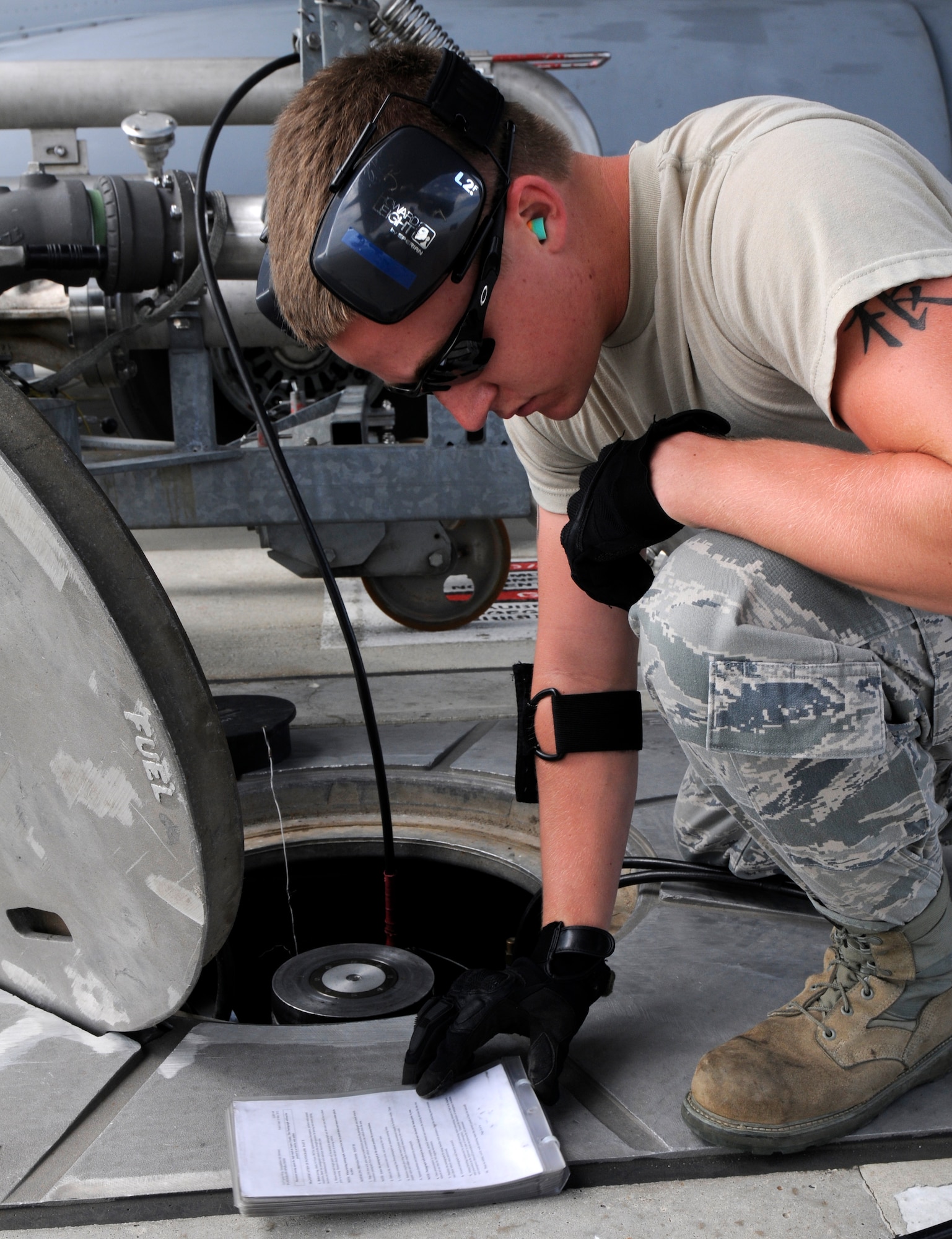 SPANGDAHLEM AIR BASE, Germany -- Airman 1st Class Ryan Brown, 52nd Logistics Readiness Squadron hydrants operator, reviews a technical order checklist during a Logistics Compliance Assessment Program inspection here Aug. 24. The LCAP is held bi-annually to ensure all logistics and maintenance squadrons are able to perform key logistics processes in a compliant manner. (U.S. Air Force photo/Airman 1st Class Brittney Frees)