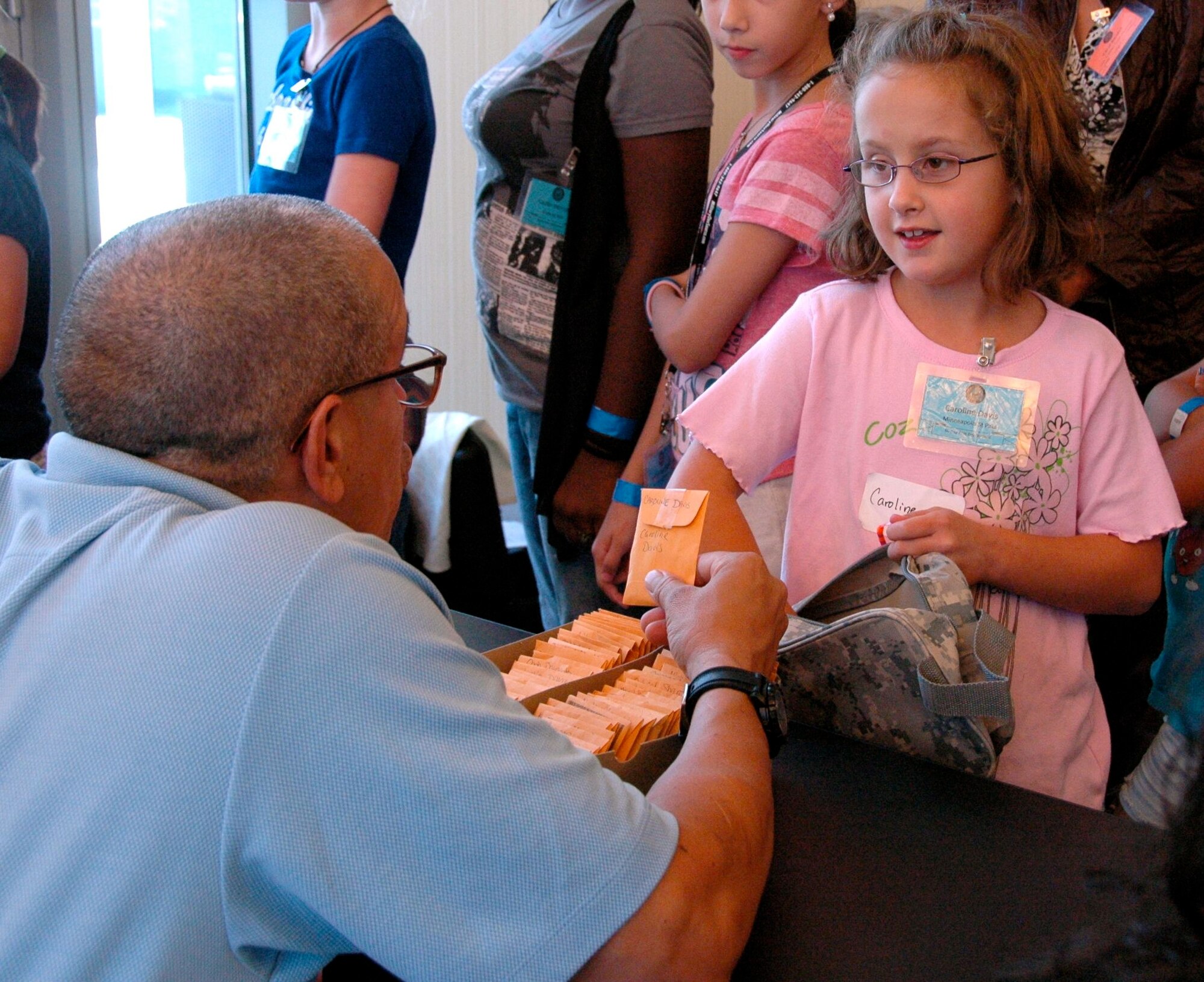 Caroline Davis, daughter of Capt. Dennis Davis, 934th Force Support Squadron  participates in a youth mock mobility line at a Yellow Ribbon event in Arlington, Va., Aug. 20, 2011.  (Air Force photo/Staff Sgt. Kimberly Hickey) 