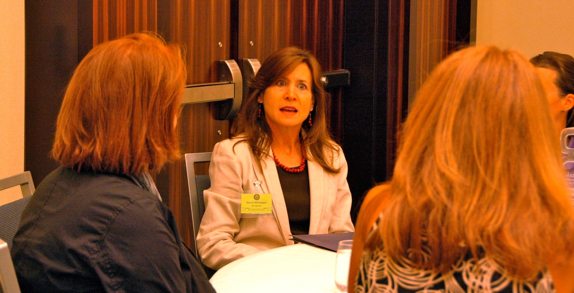Mrs. Nancy McKeague, wife of Maj. Gen. Kelly K. McKeague, Assistant to Chairman of the Joint Chiefs of Staff for National Guard Matters, joins a breakout session as an advocate for the Key Spouse program at a Yellow Ribbon event in Arlington, VA, Aug. 20, 2011.  Over 210 Airmen and their family members participated in the reintegration event.  (Air Force photo/Staff Sgt. Kimberly Hickey)