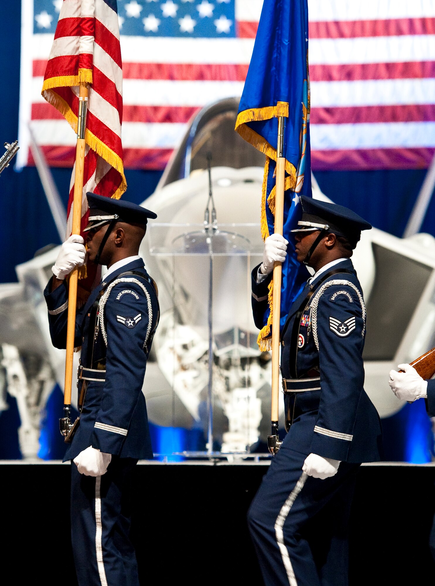 Eglin's honor guard brings in the colors during the F-35 Lightning II joint strike fighter's official rollout ceremony here Aug. 26.  (U.S. Air Force photo/Samuel King Jr.)