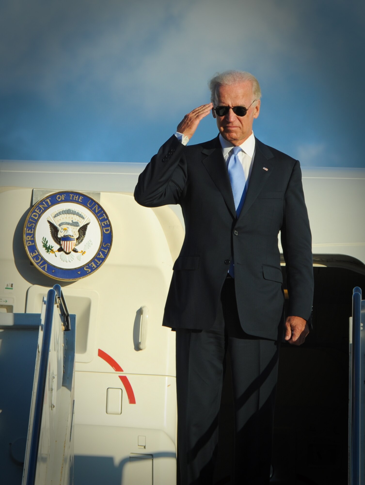 Vice President Biden gives one final salute as he prepares to depart Joint Base Pearl Harbor-Hickam, Hawaii, Aug. 25. Biden made a brief stop on the island after returning from a visit overseas. (U.S. Air Force photo/Tech. Sgt. Anthony Gomez)