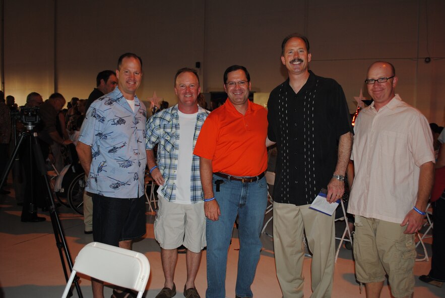 KIRTLAND AFB, N.M. -- From left, Col. Jim Cardoso, 58th Special Operations Wing commander, Col. David Hornyak, 377th Air Base Wing vice commander, Tom Berardinelli, 377 ABW director of staff, Richard Berry, Albuquerque mayor, and Col. Don Conley, 377th Mission Support Group commander, attended the third annual Ooh La La Wounded Warrior Benefit Dinner and Dance at Atlantic Aviation on Saturday. (photo by Marie Vanover)